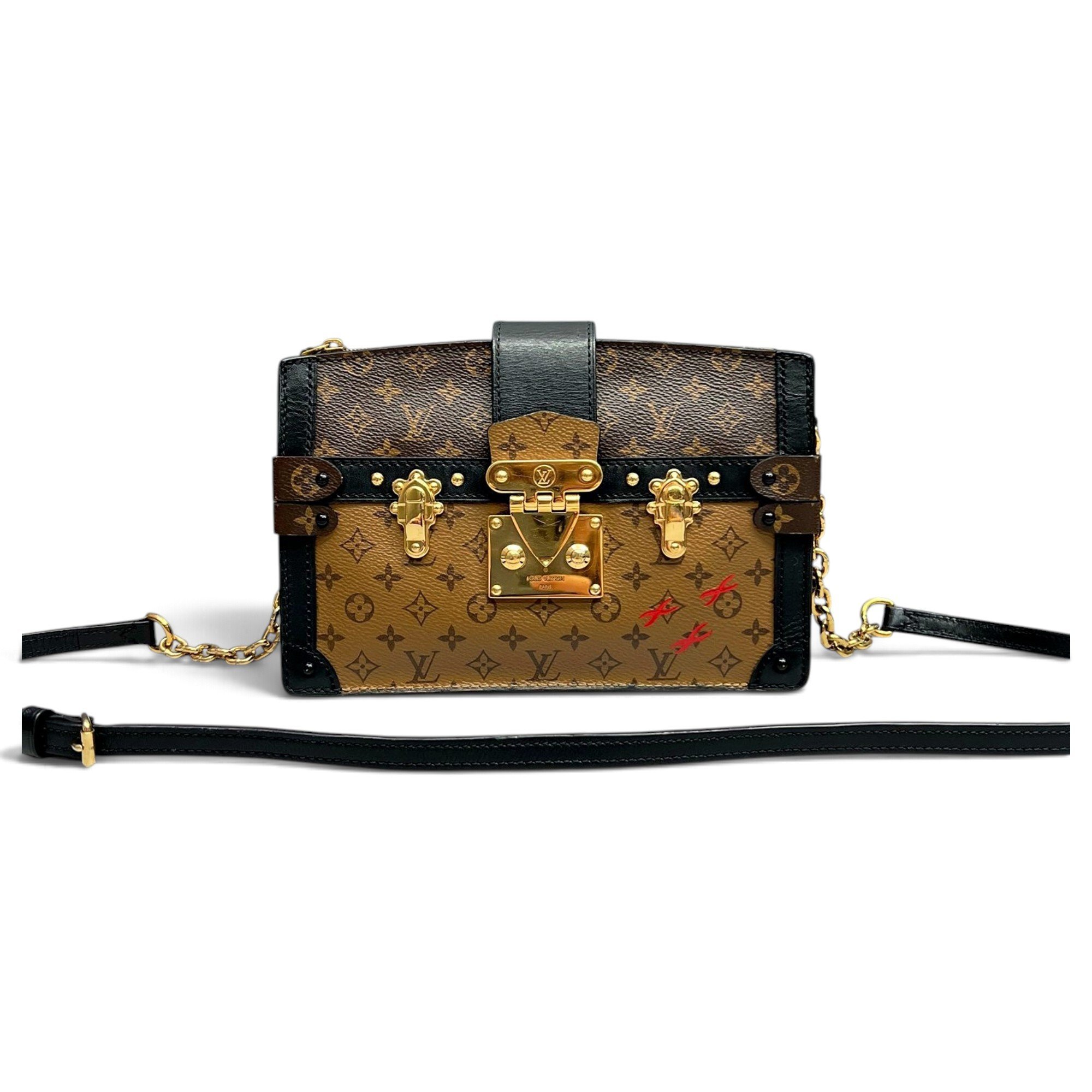 Pochette Trunk leather handbag