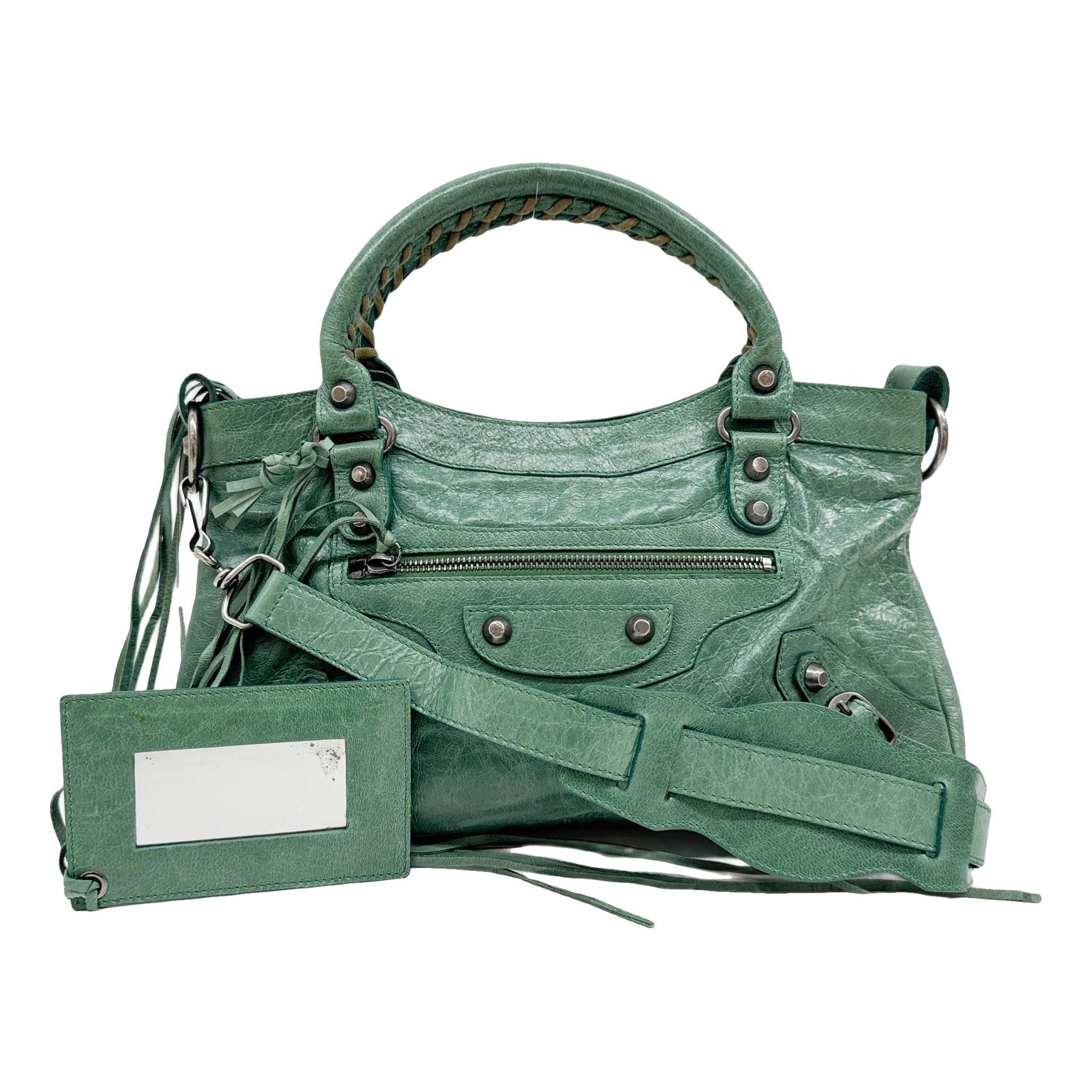 First leather handbag