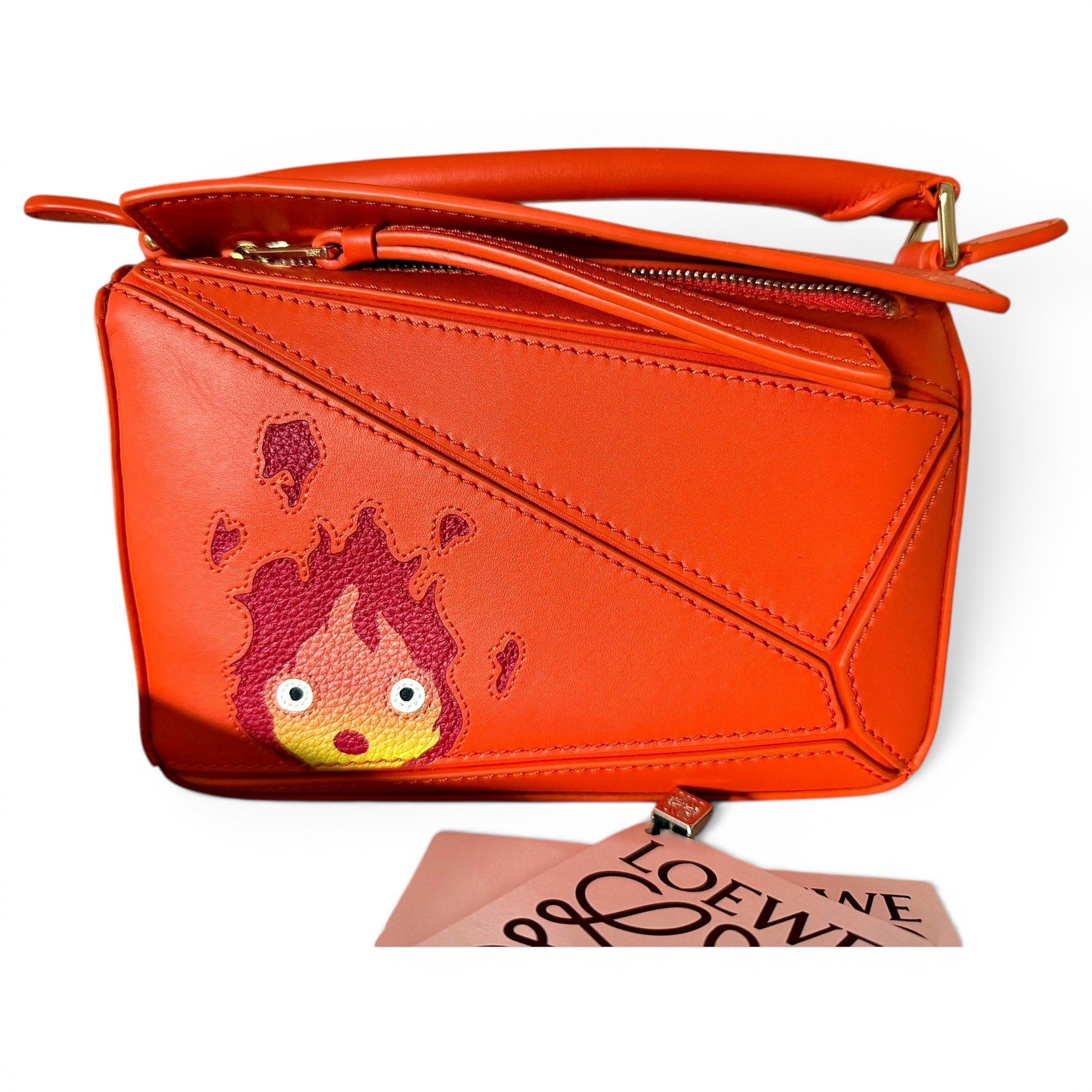 Puzzle leather handbag