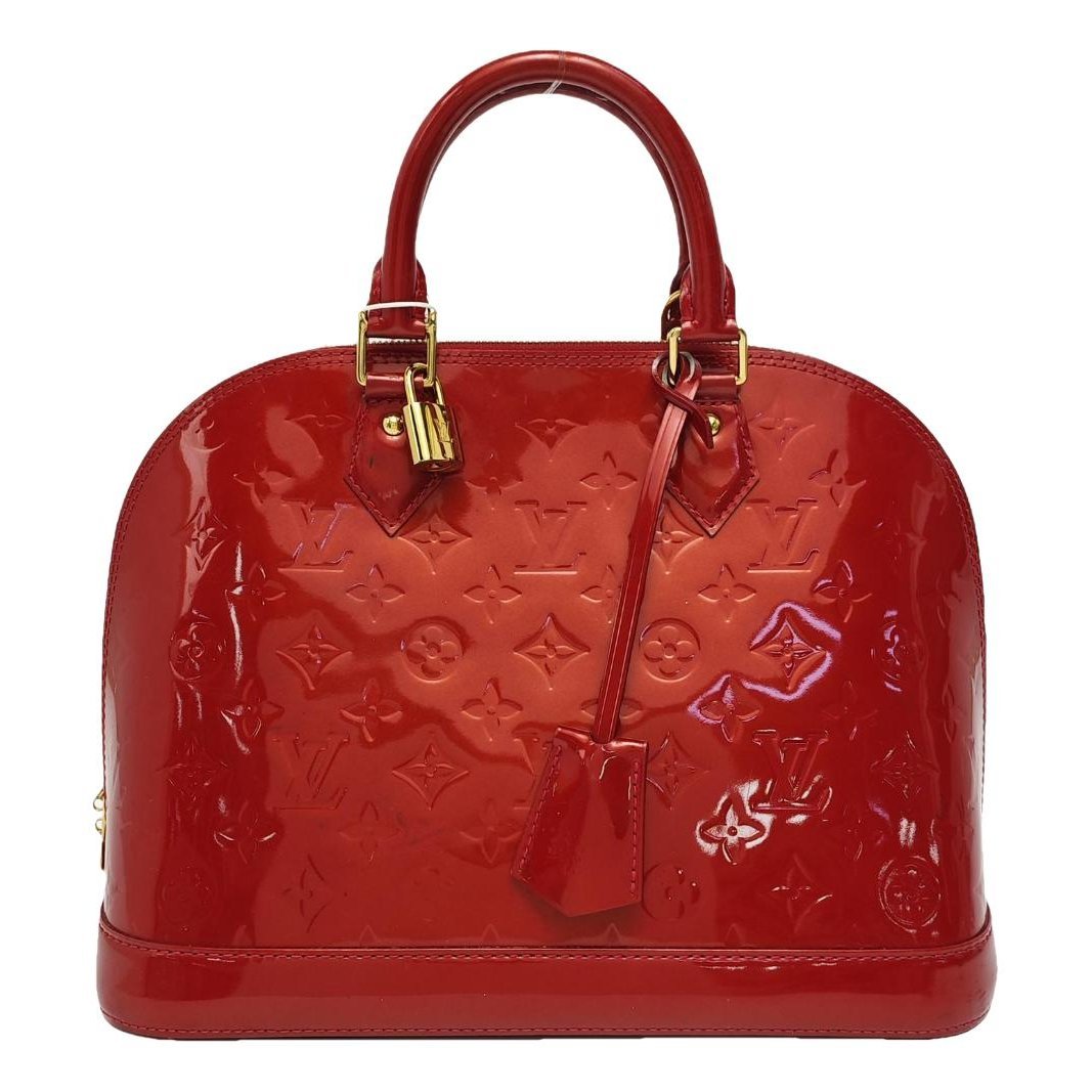 Alma BB patent leather handbag