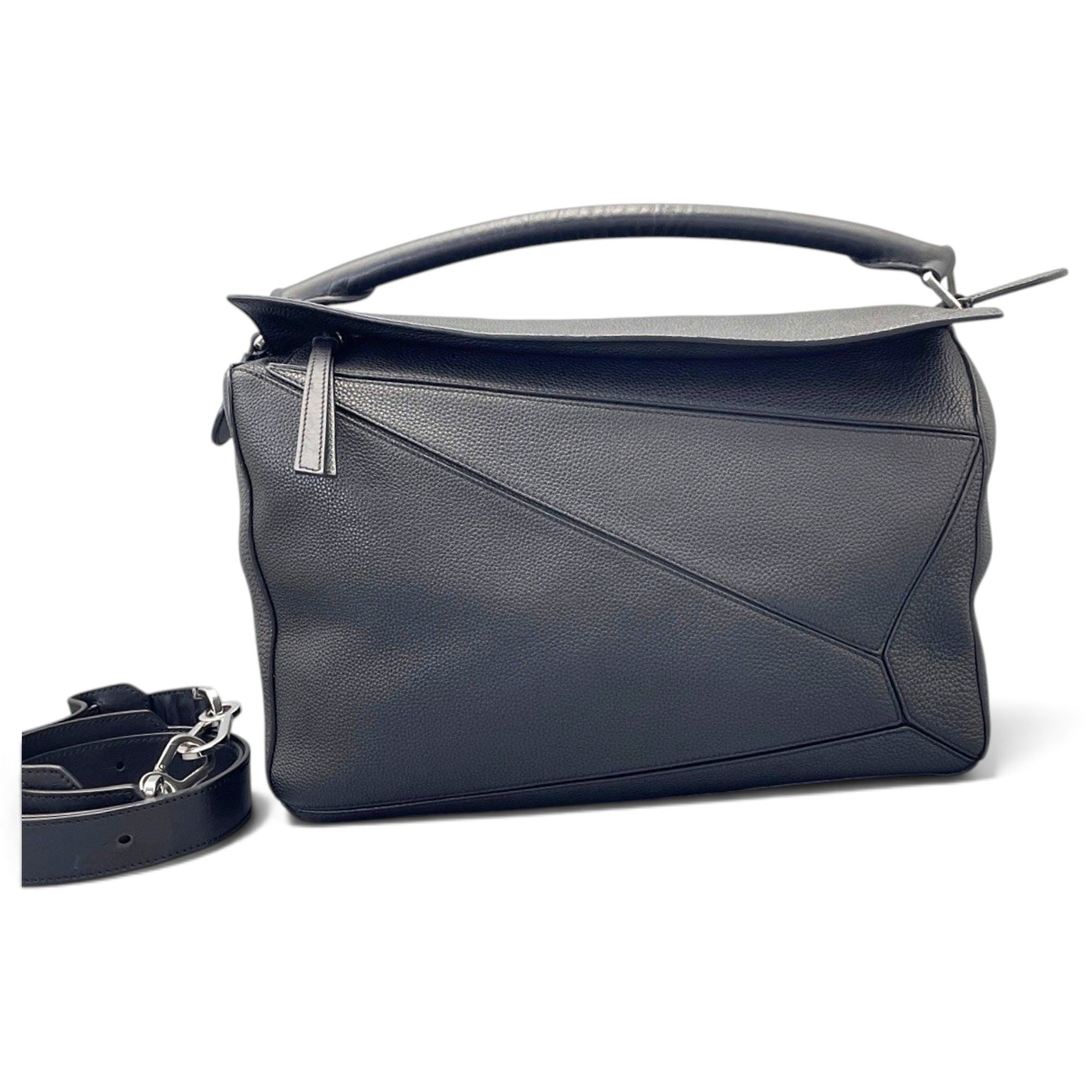 Puzzle leather handbag