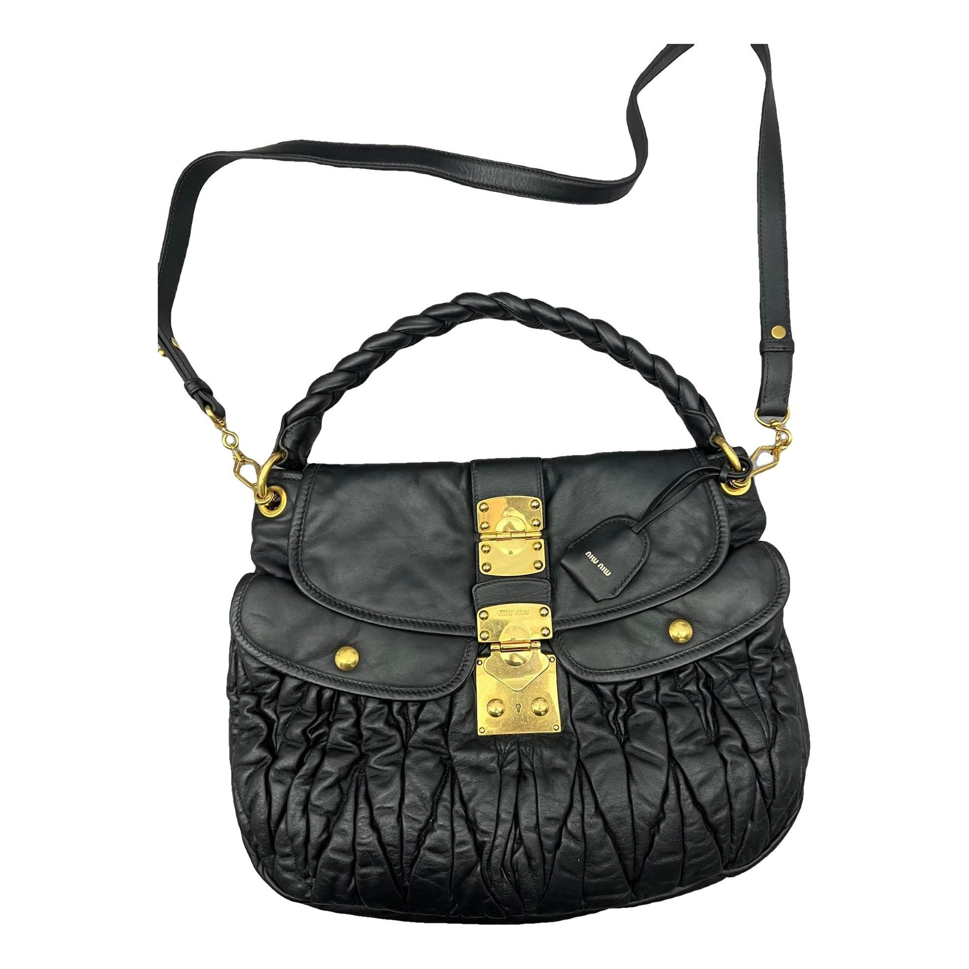 Coffer leather handbag