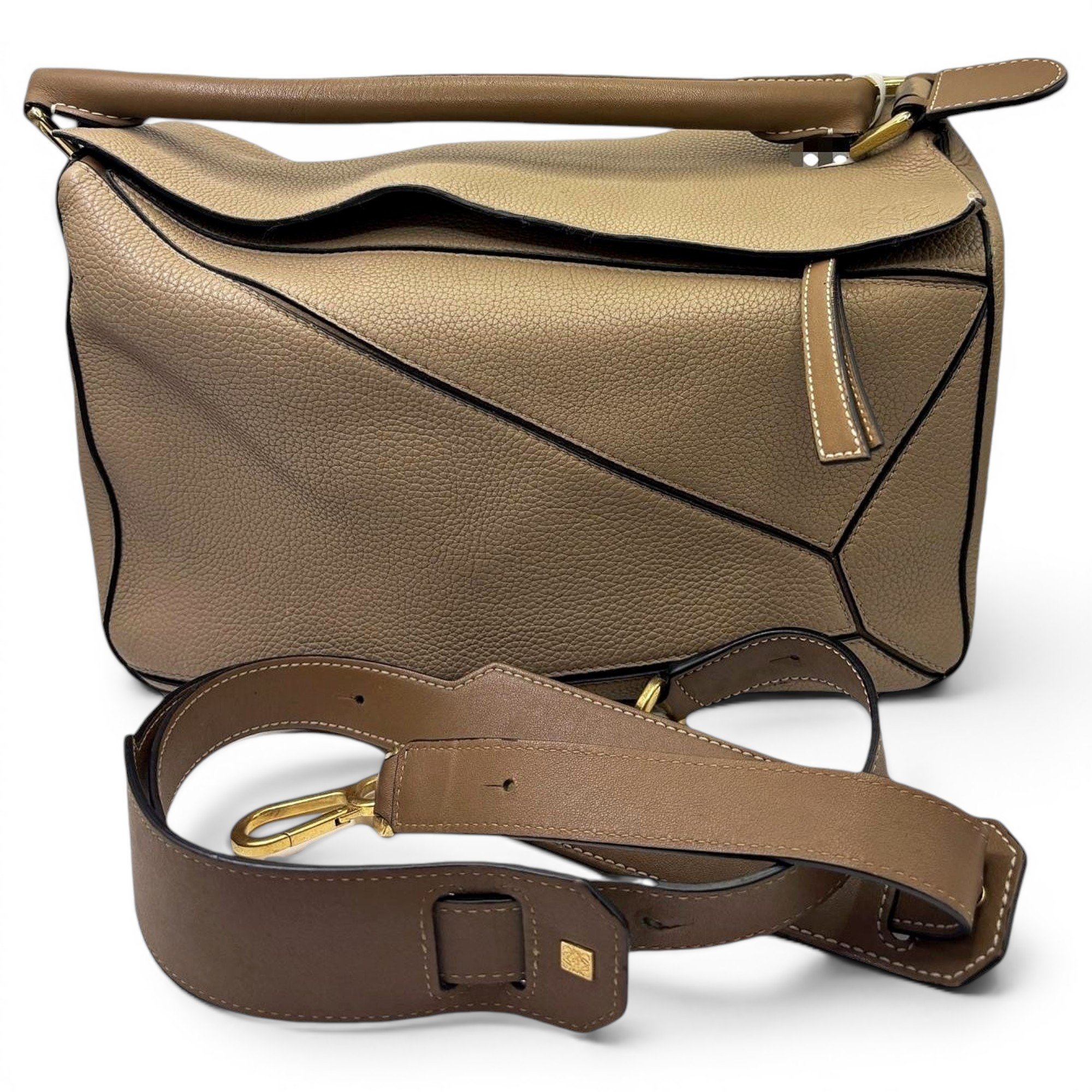 Puzzle leather handbag