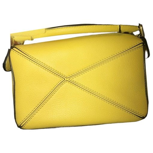 Puzzle leather handbag