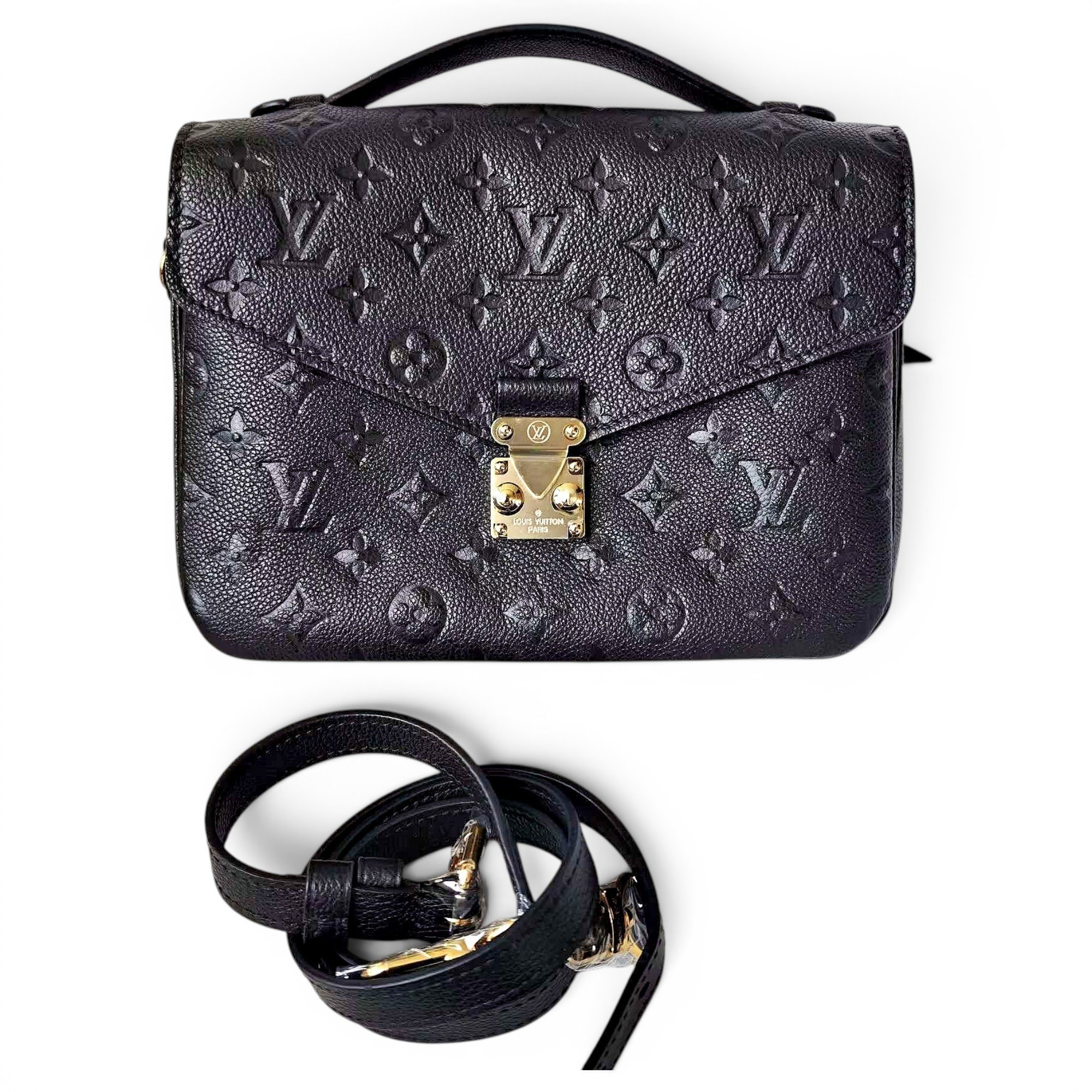 Louis Vuitton Pochette Trunk leather handbag