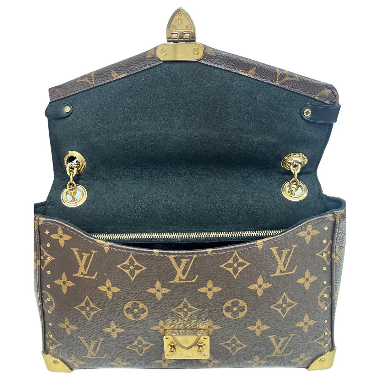 Pochette Trunk leather handbag