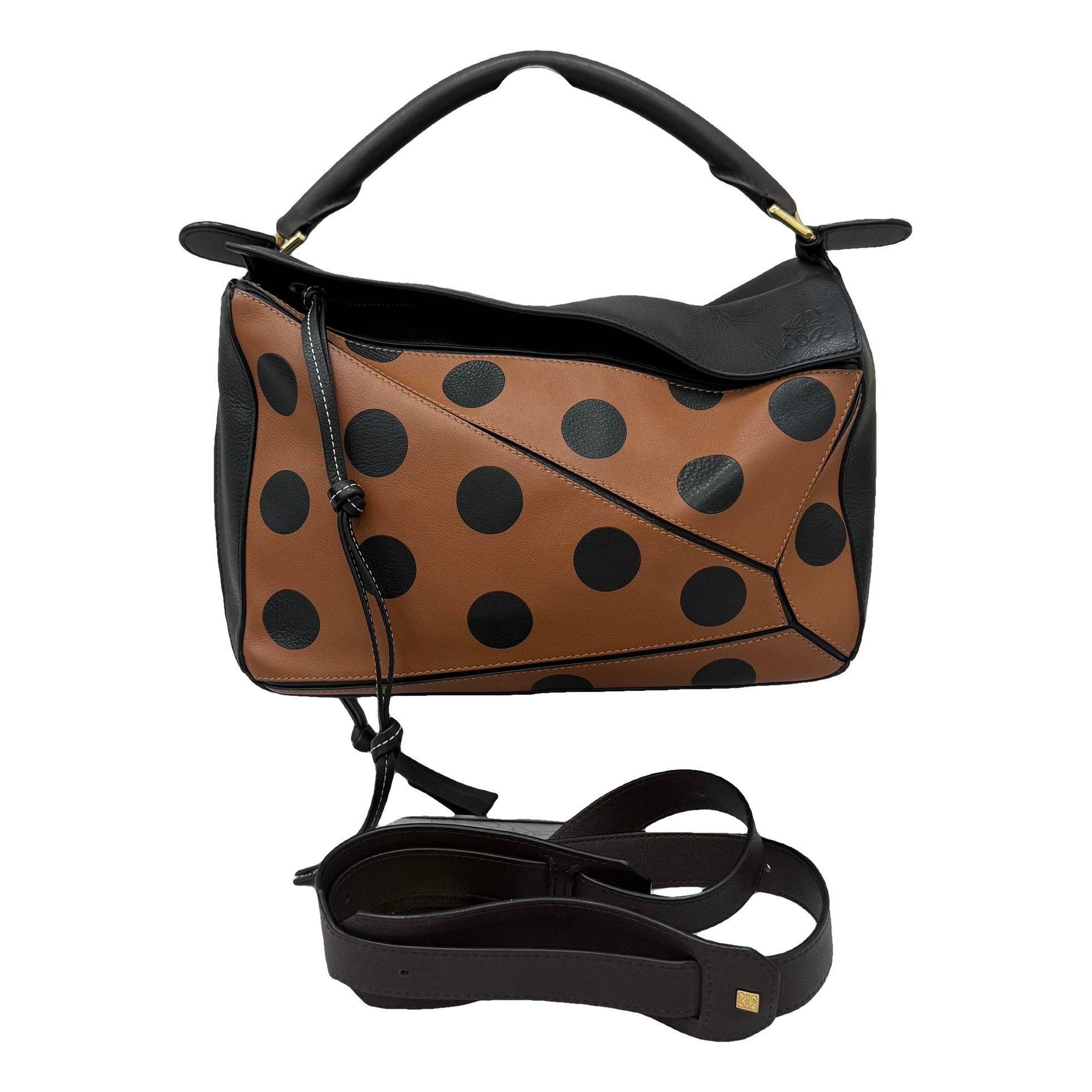 Puzzle leather handbag