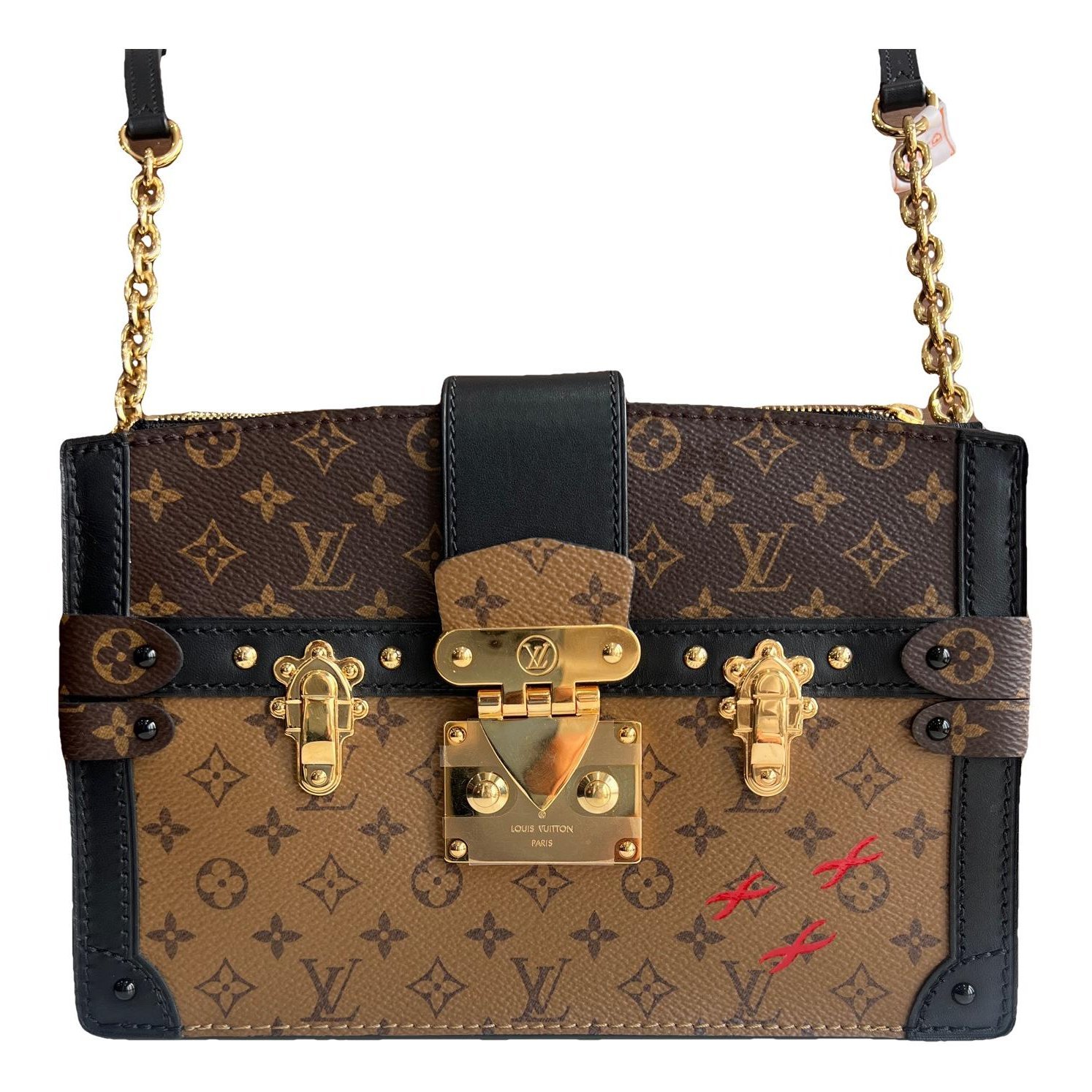 Pochette Trunk leather handbag