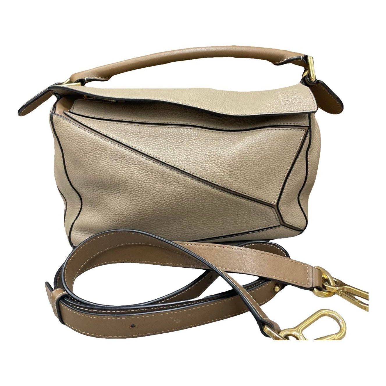 Puzzle leather handbag