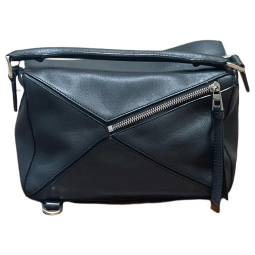 Puzzle leather handbag