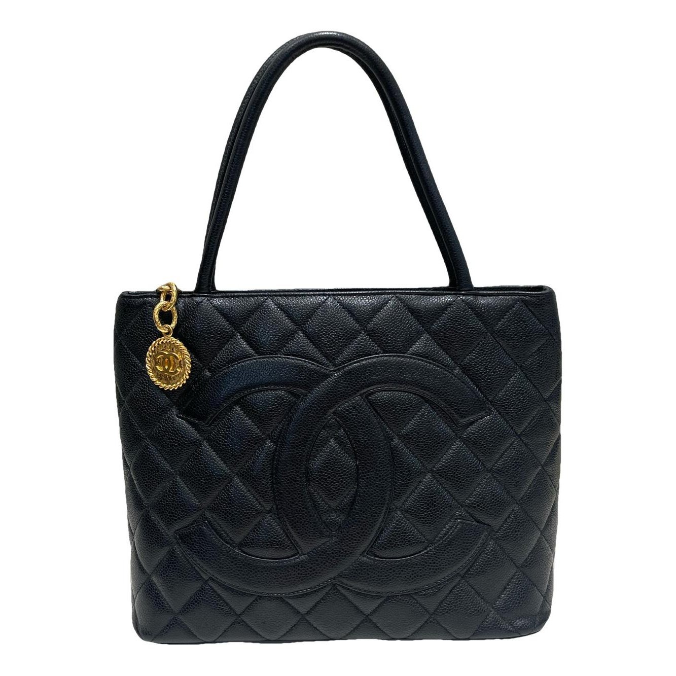 Médaillon leather handbag