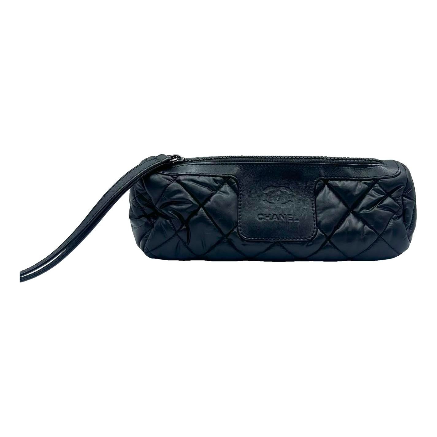 Cocoon vinyl clutch bag