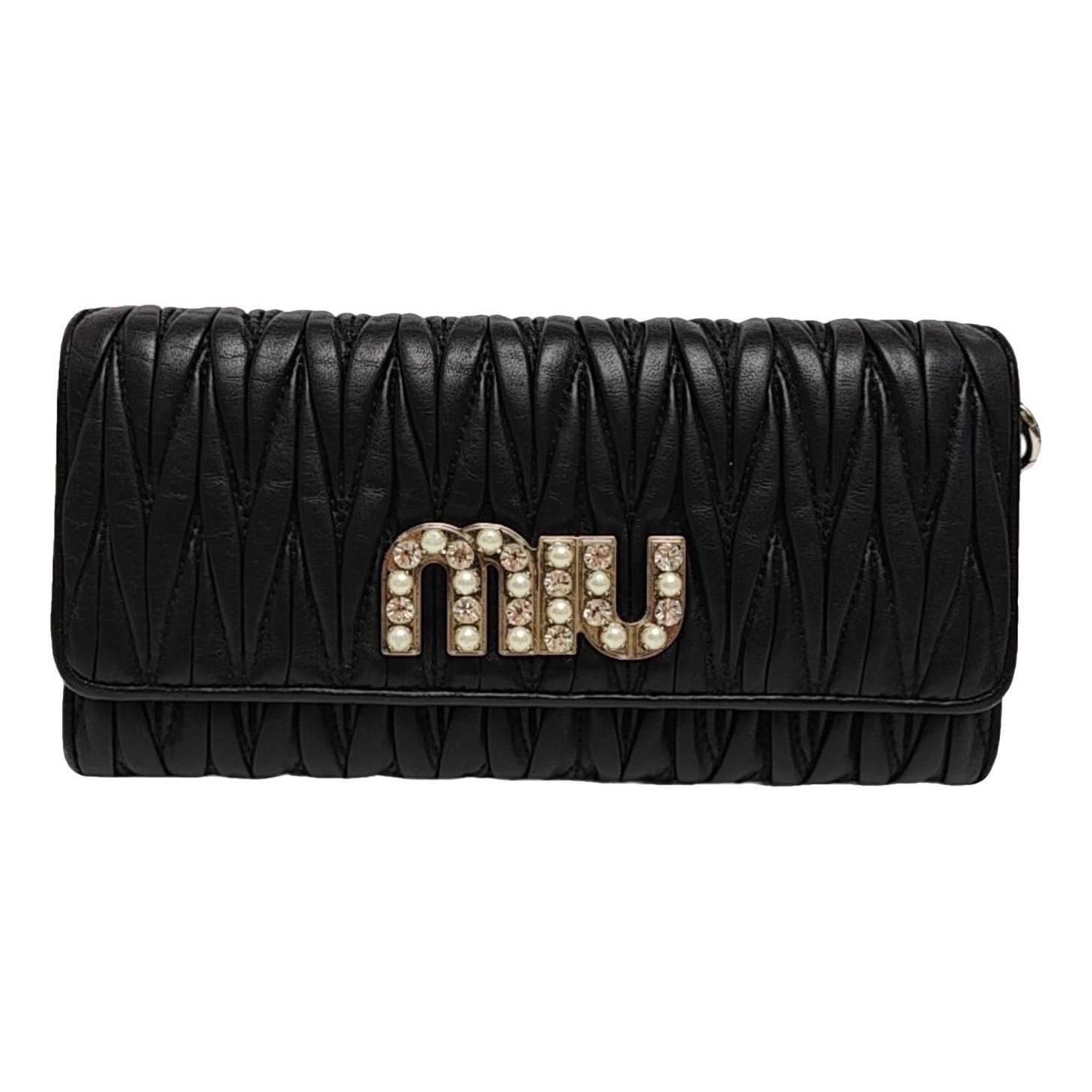 Miu Crystal leather handbag