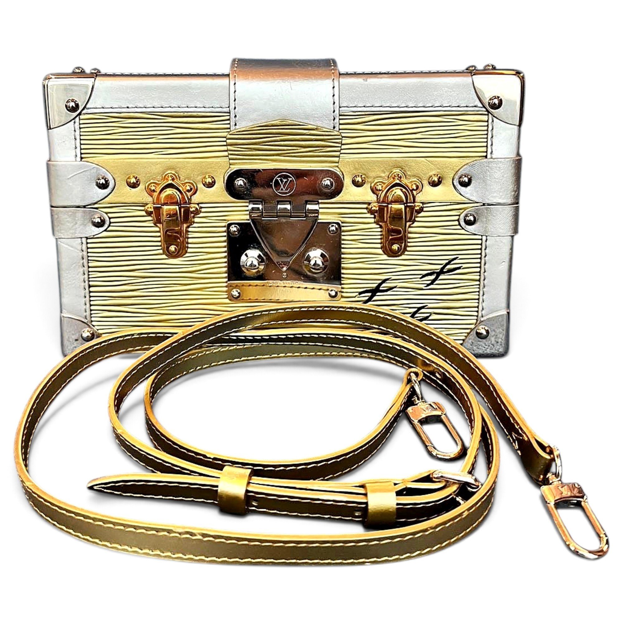 Pochette Trunk leather handbag
