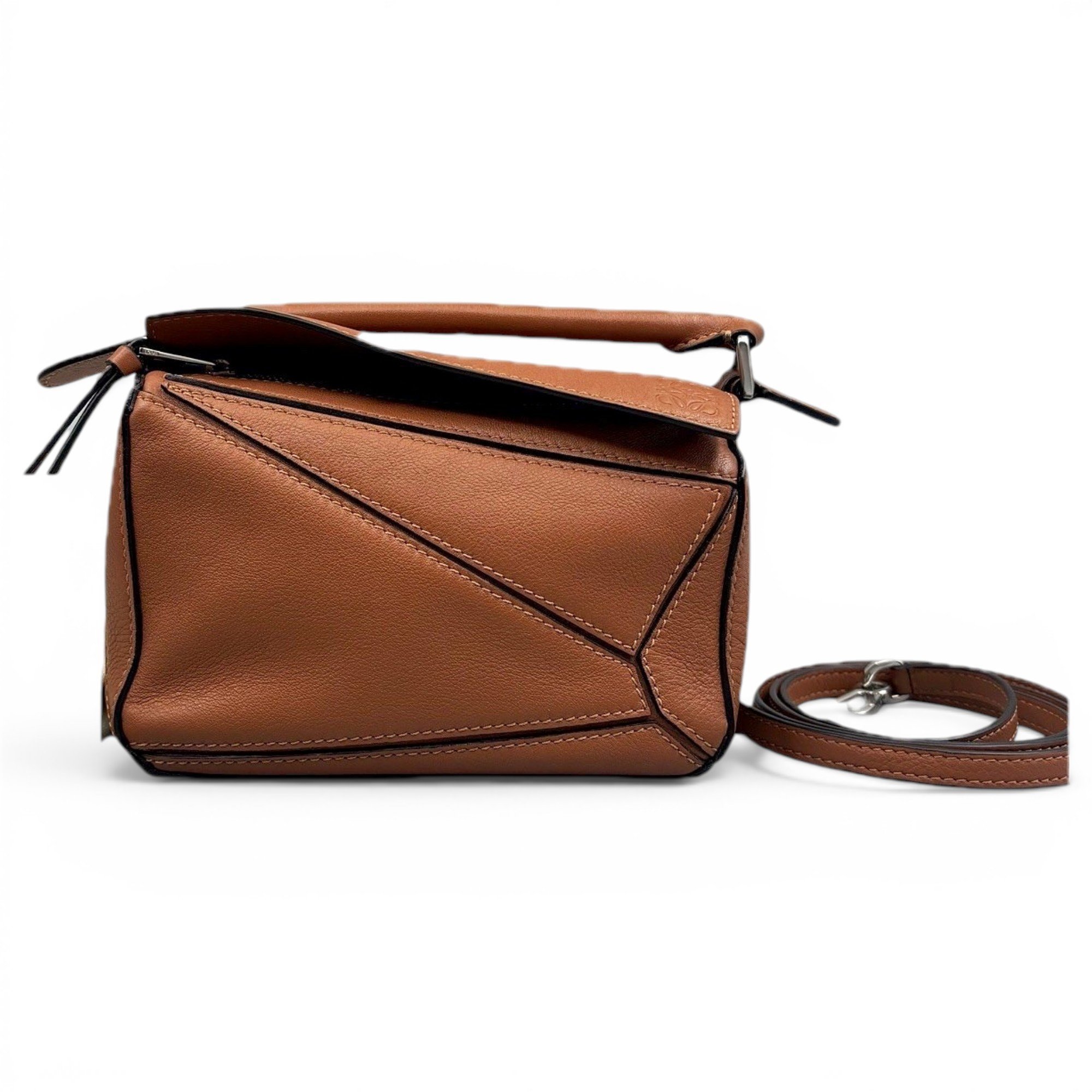 Puzzle leather handbag