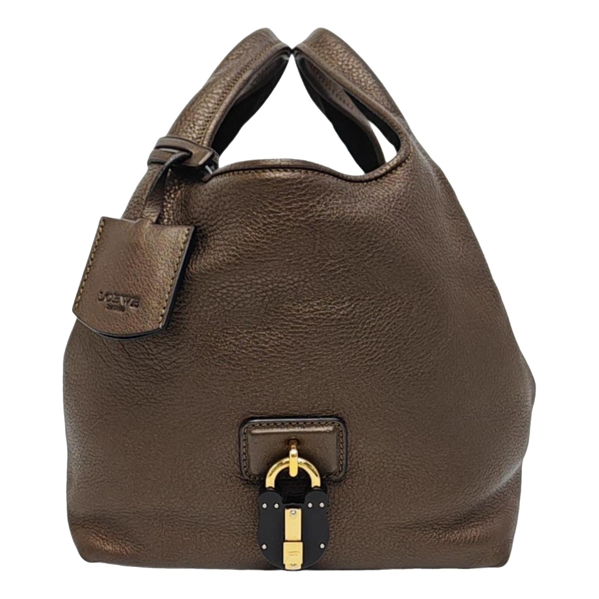 Symmetrical leather handbag