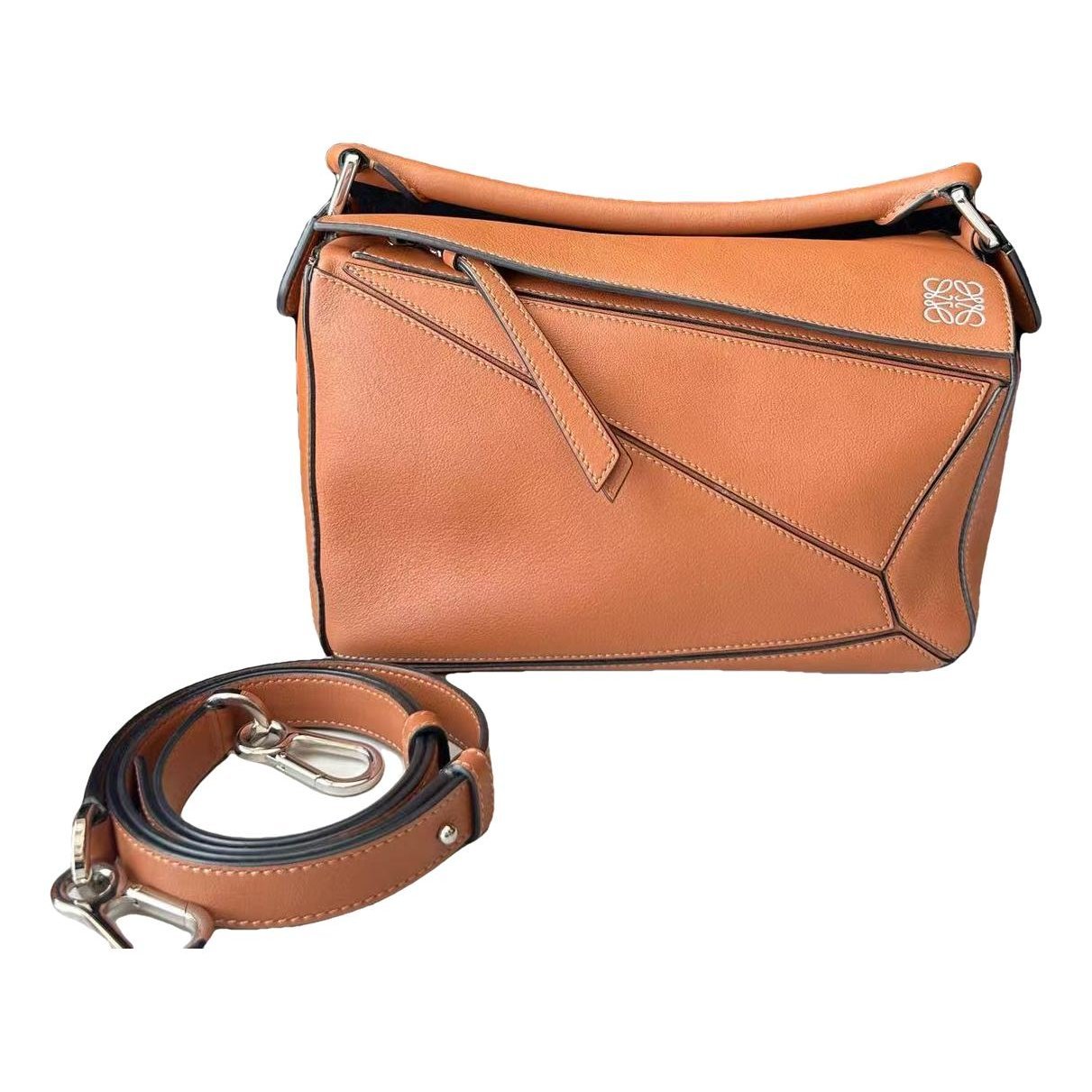 Puzzle leather handbag