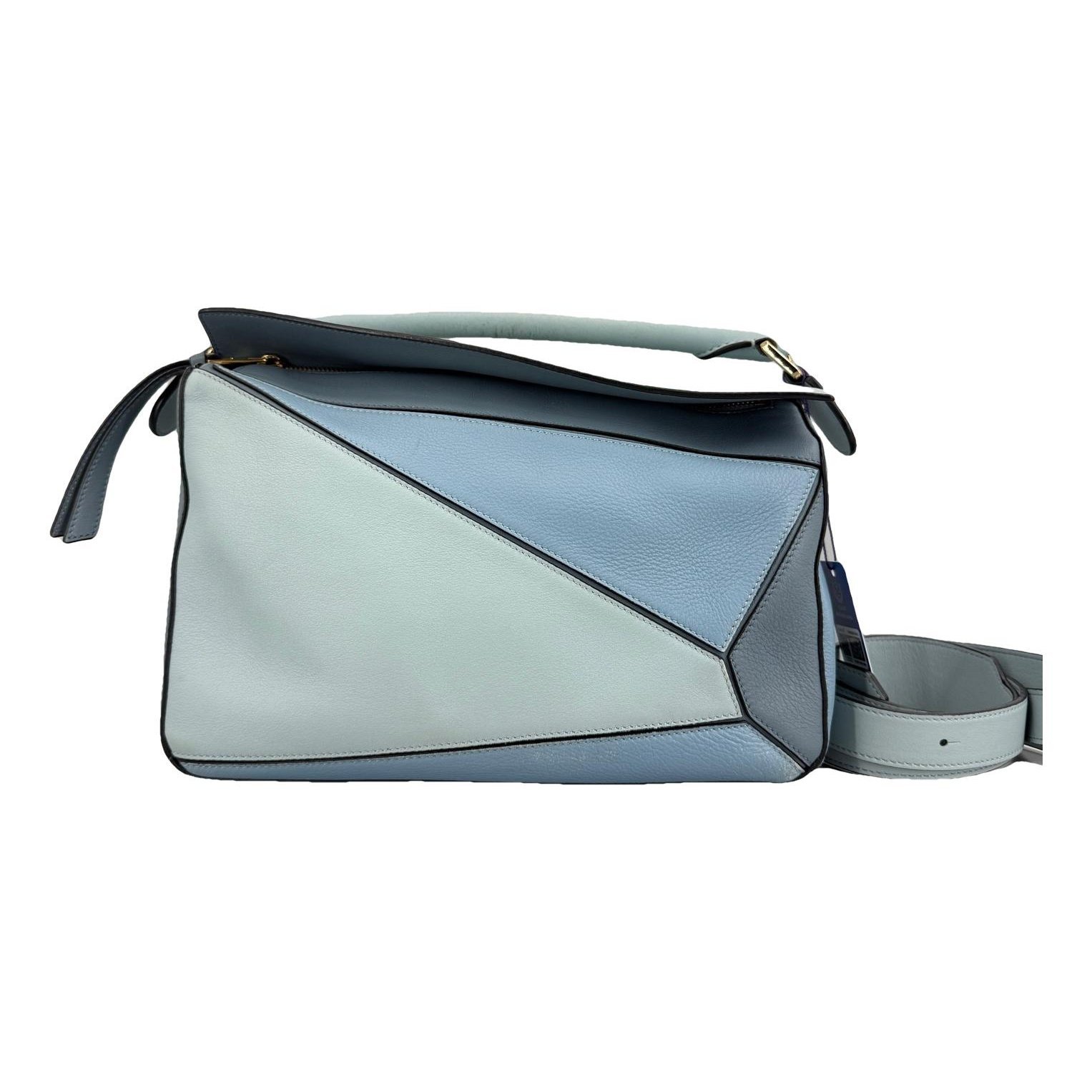 Puzzle leather handbag