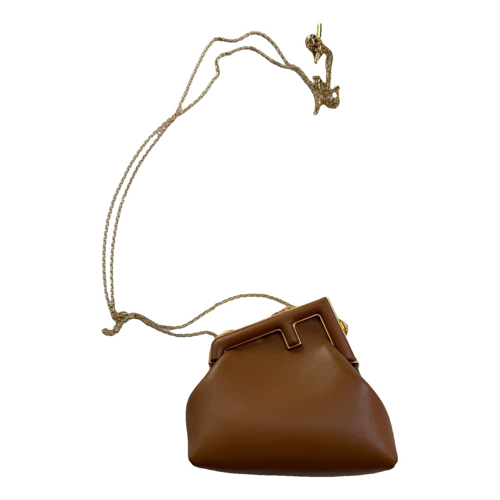 First leather crossbody bag
