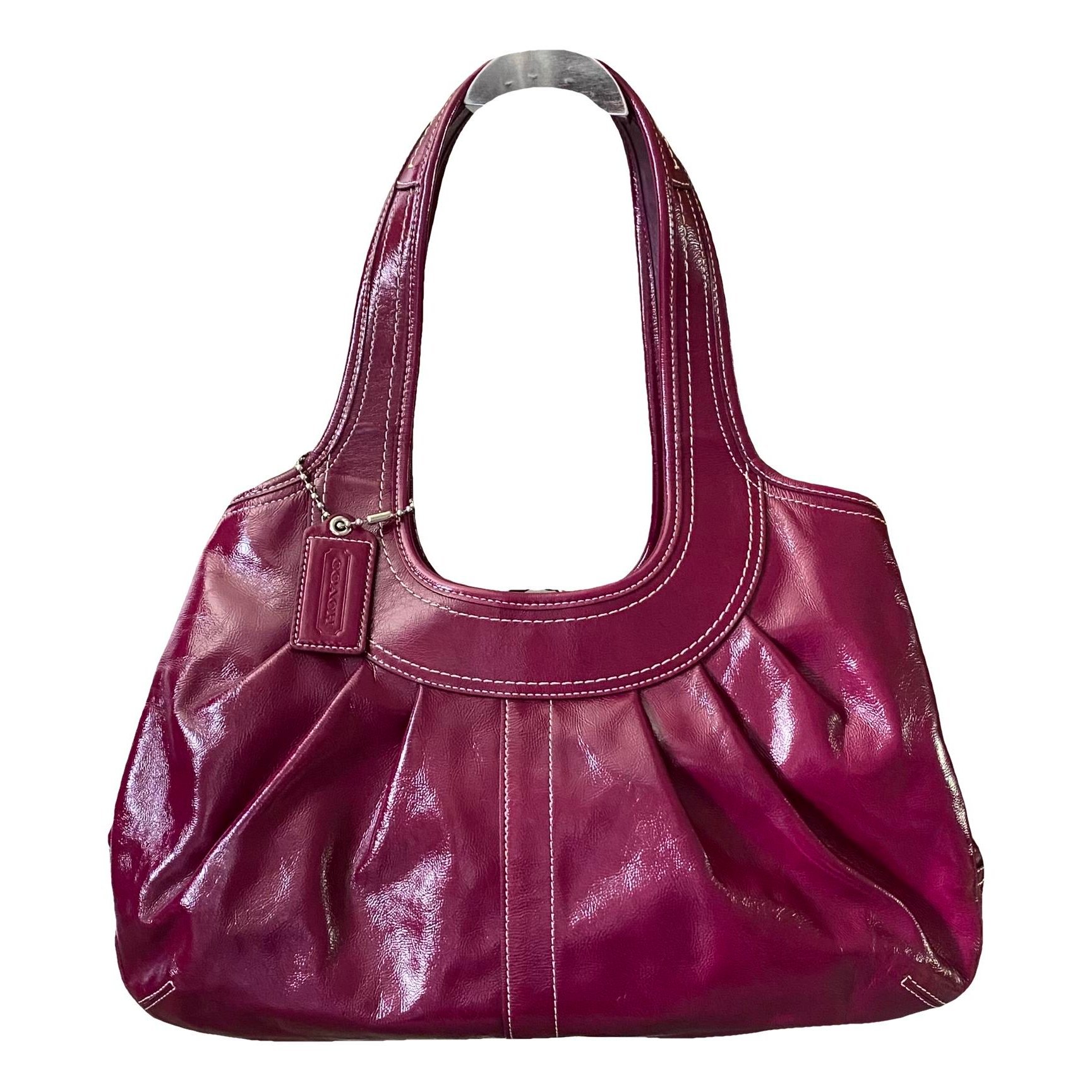 Signature Sufflette patent leather handbag