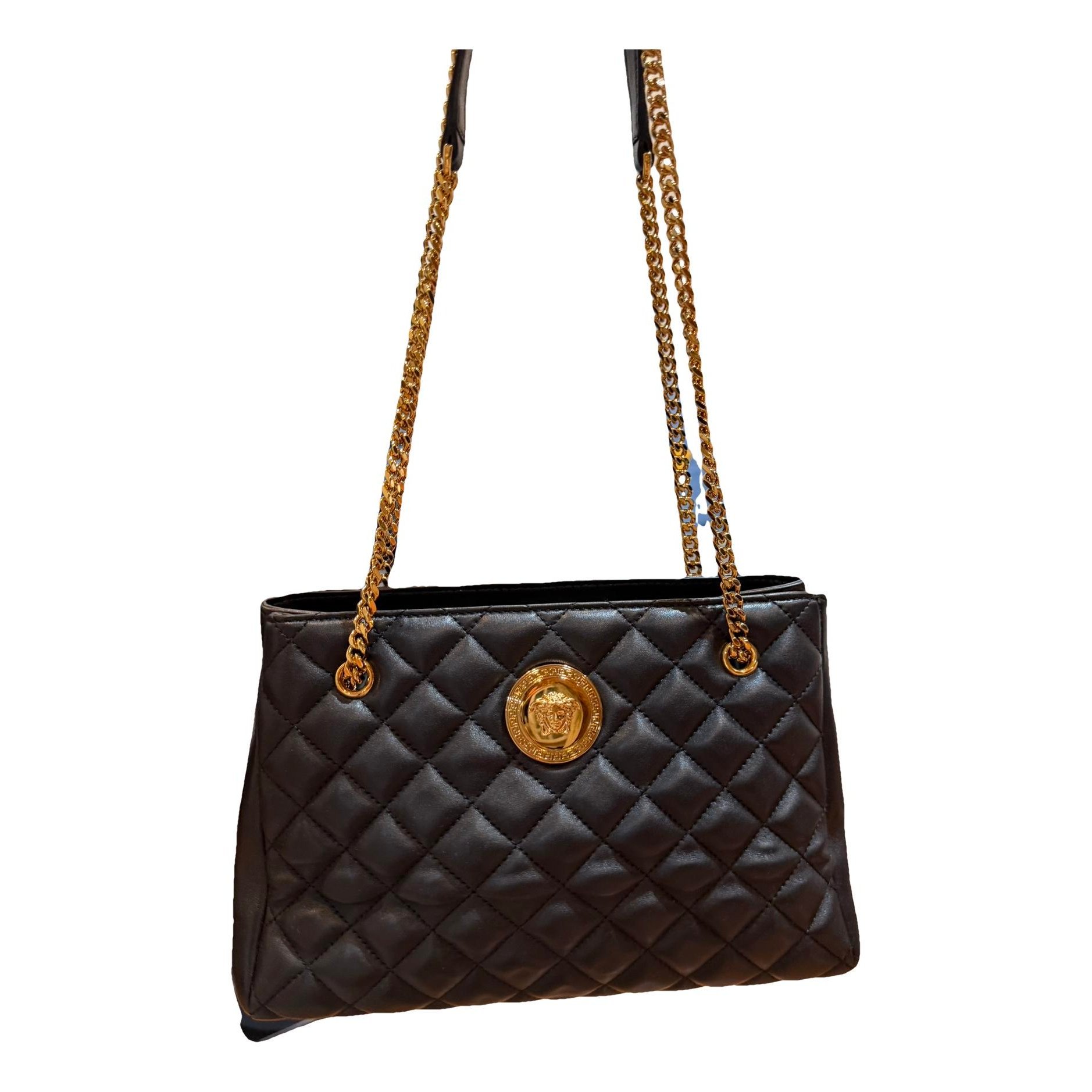 La Medusa leather clutch bag