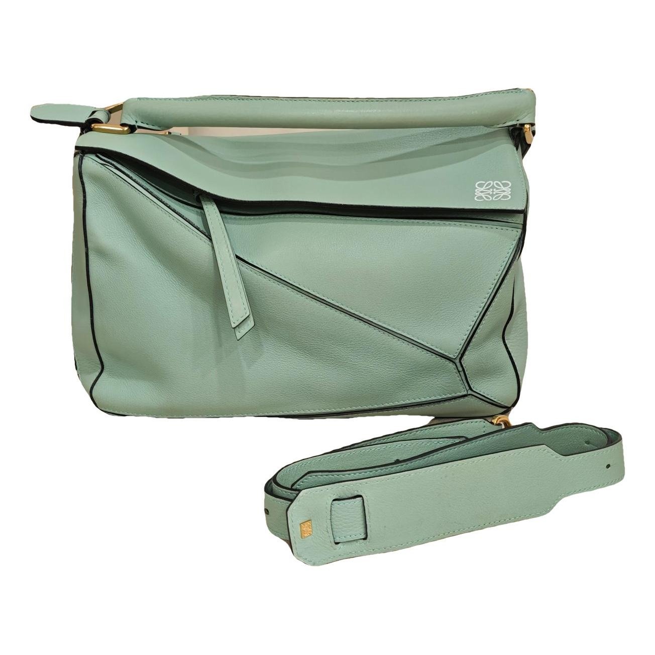 Puzzle leather handbag