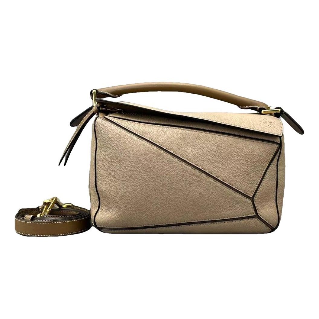 Puzzle leather handbag