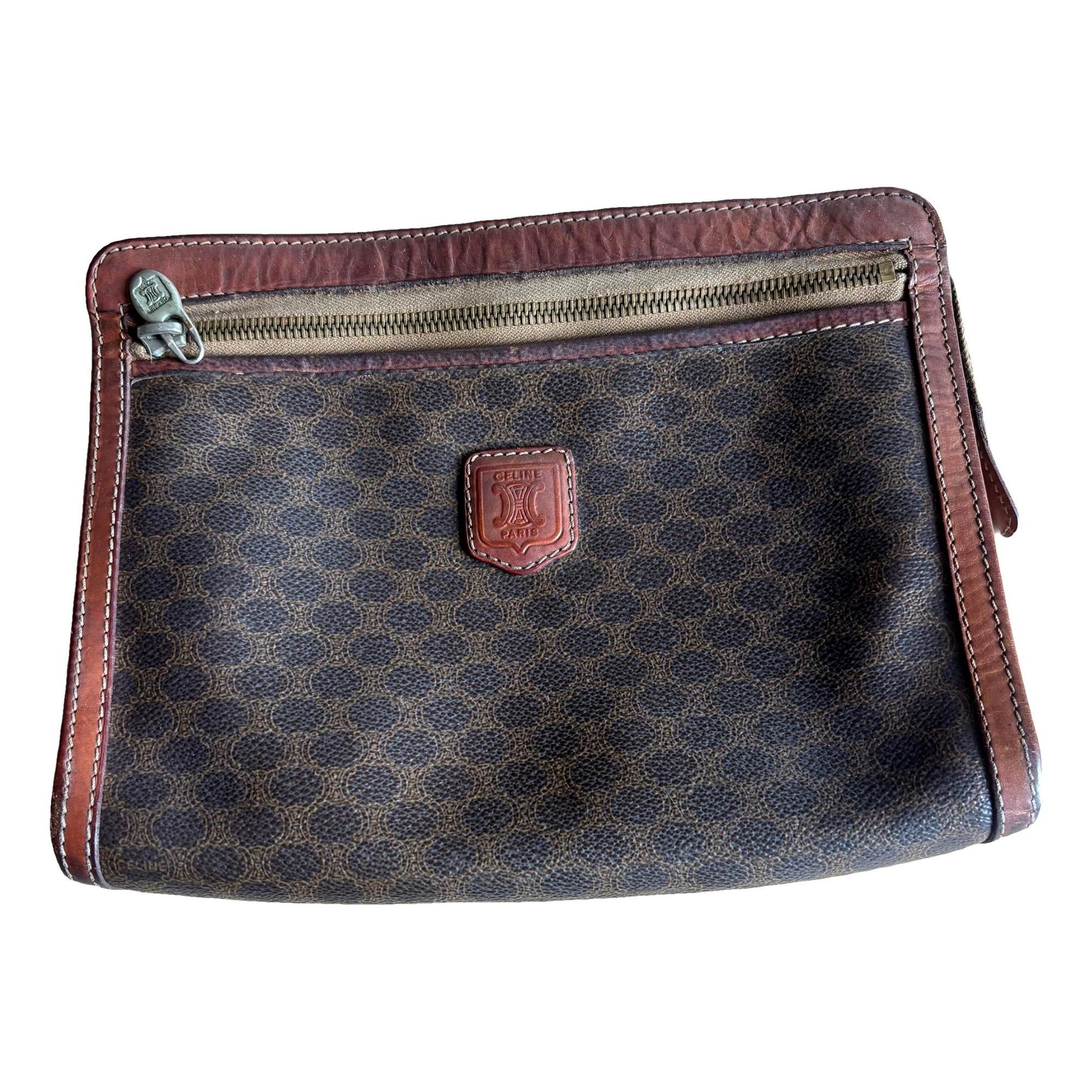 Triomphe Vintage leather clutch bag