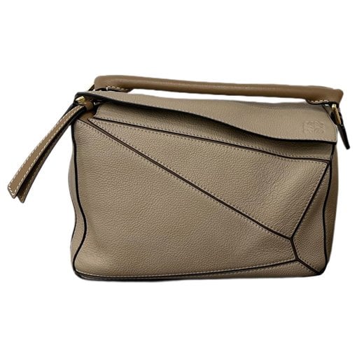 Puzzle leather handbag