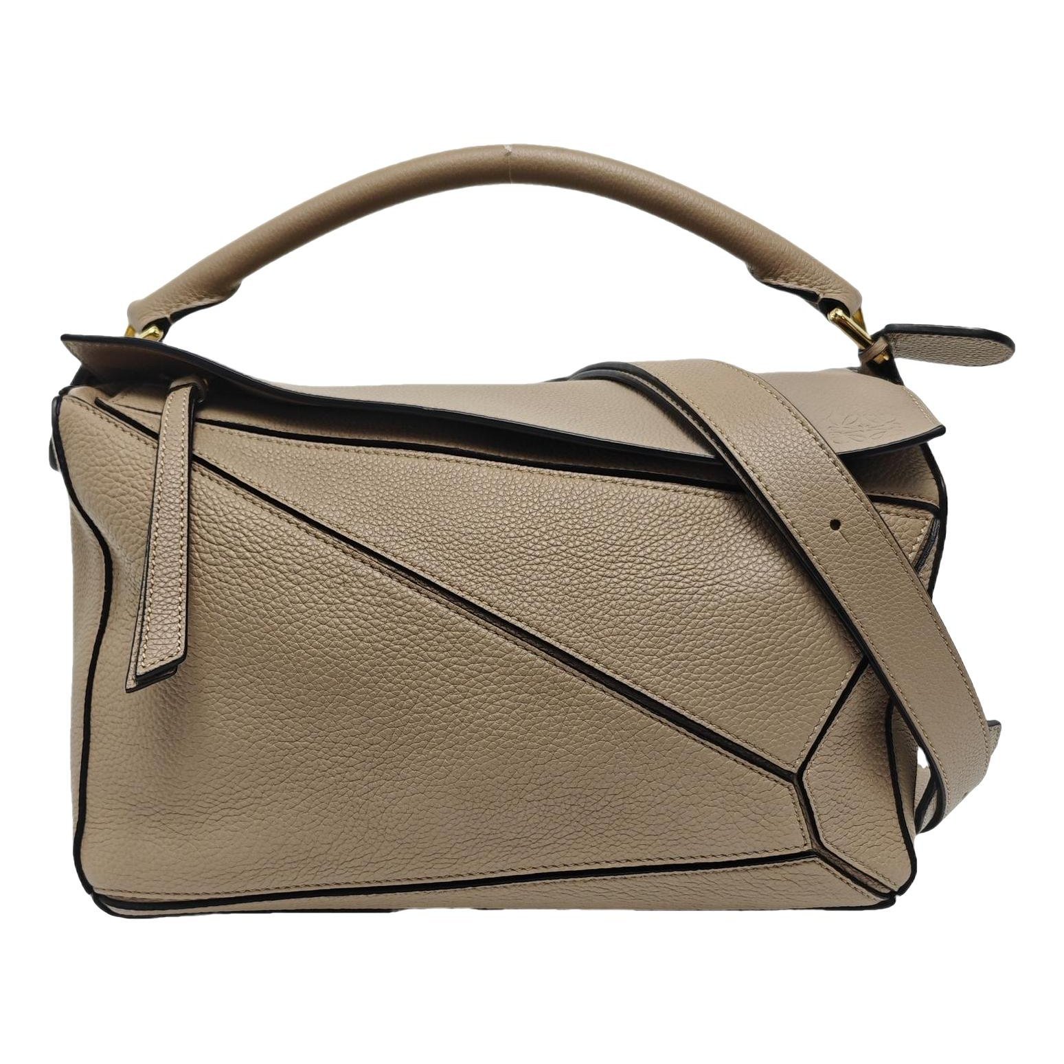 Puzzle leather handbag
