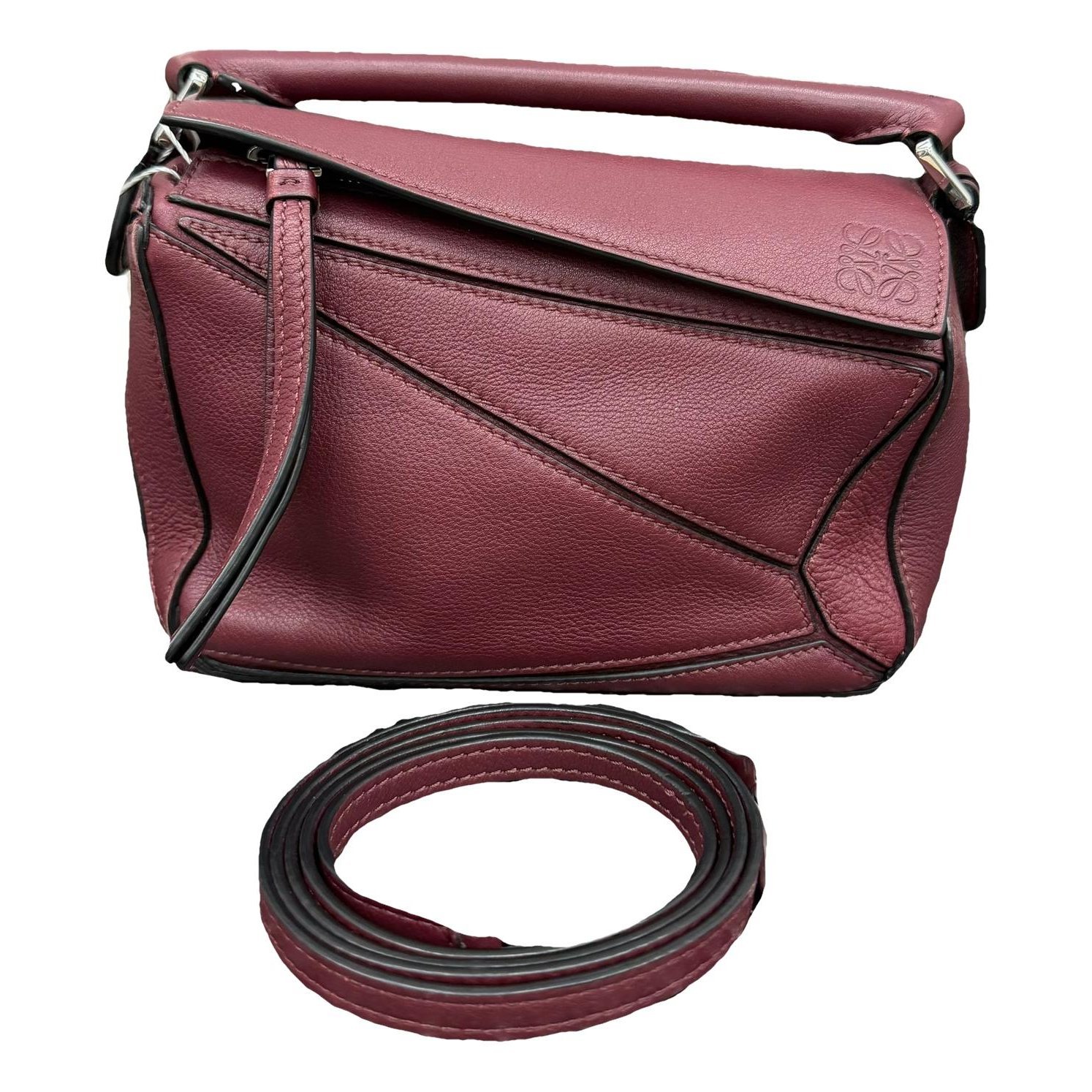 Puzzle leather handbag