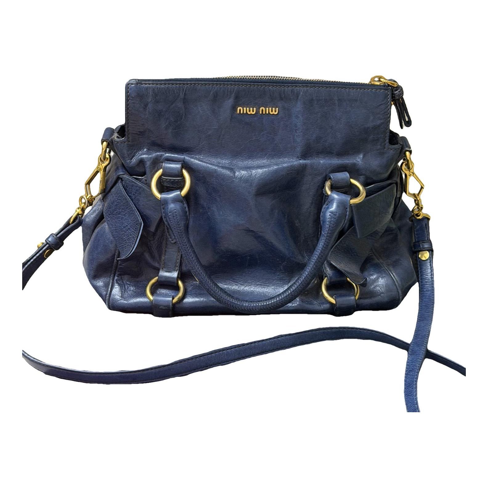 Bow bag leather handbag