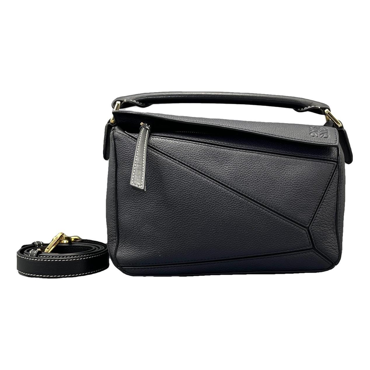 Puzzle leather handbag