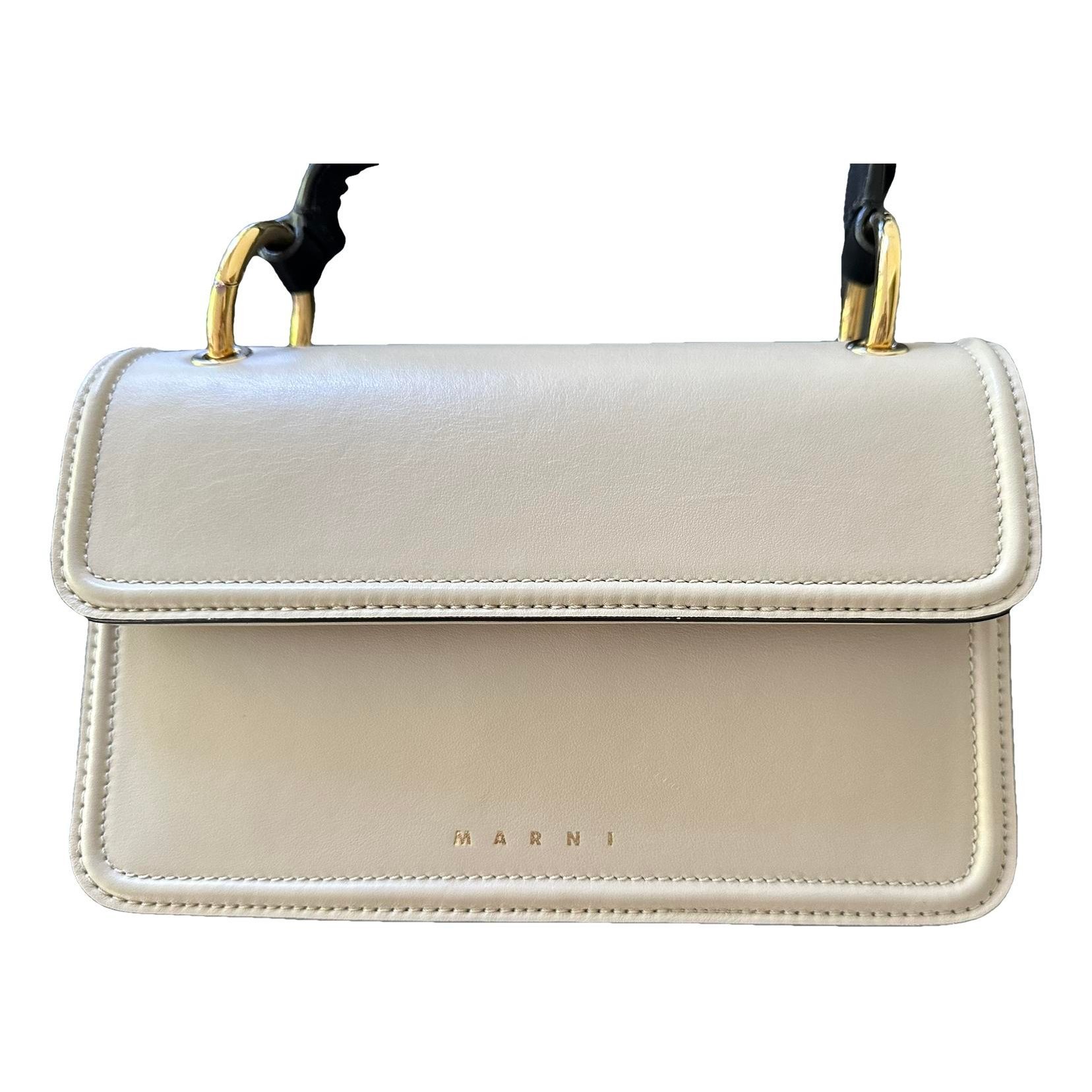 Trunk leather crossbody bag