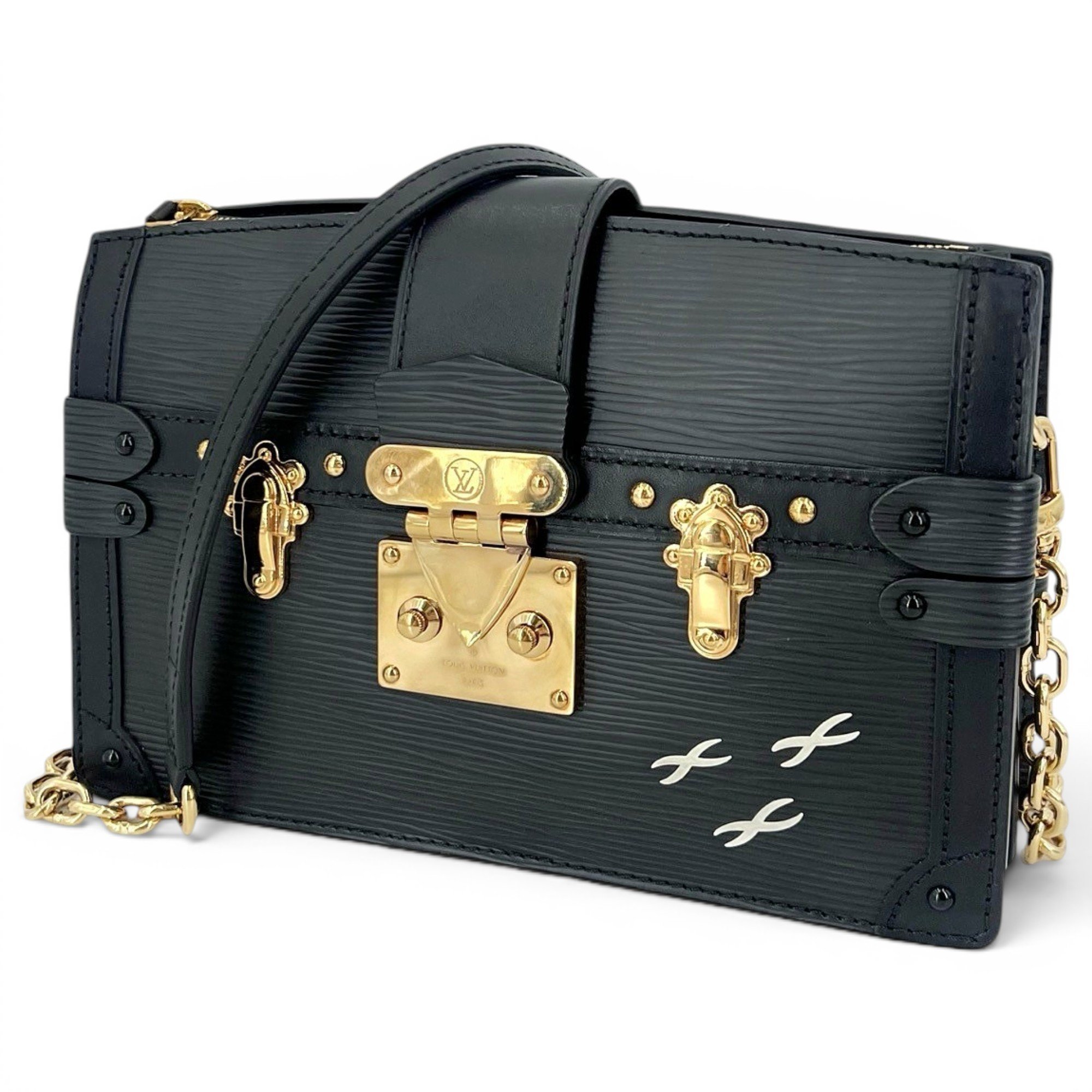 Pochette Trunk leather handbag