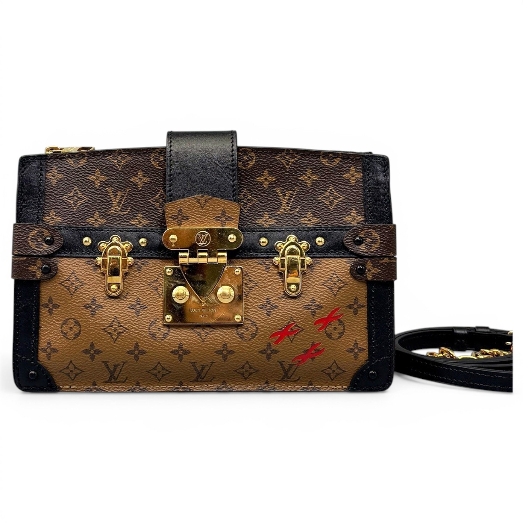 Pochette Trunk leather handbag