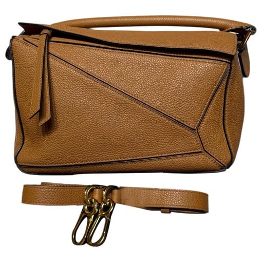 Puzzle leather handbag