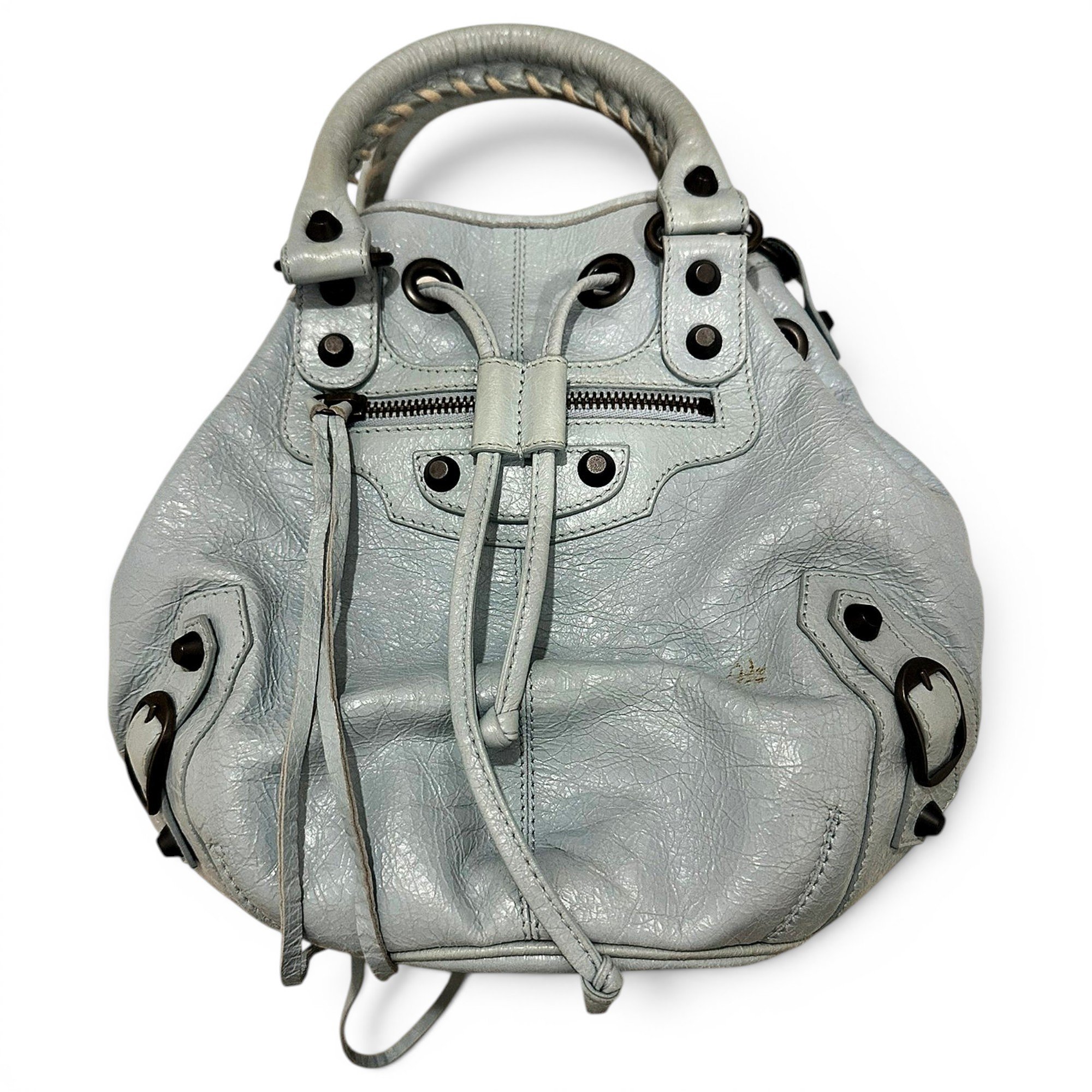 Pompon leather handbag