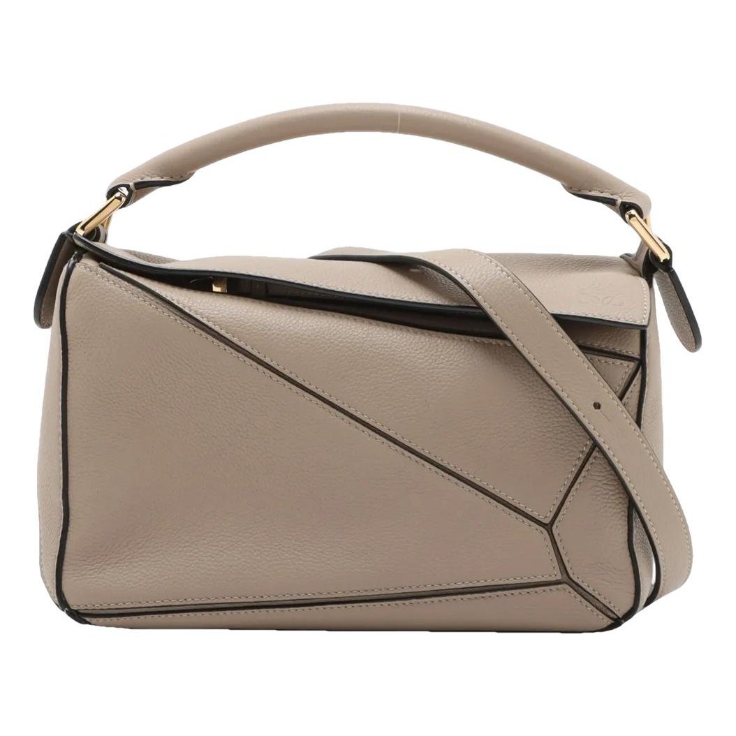 Puzzle leather handbag
