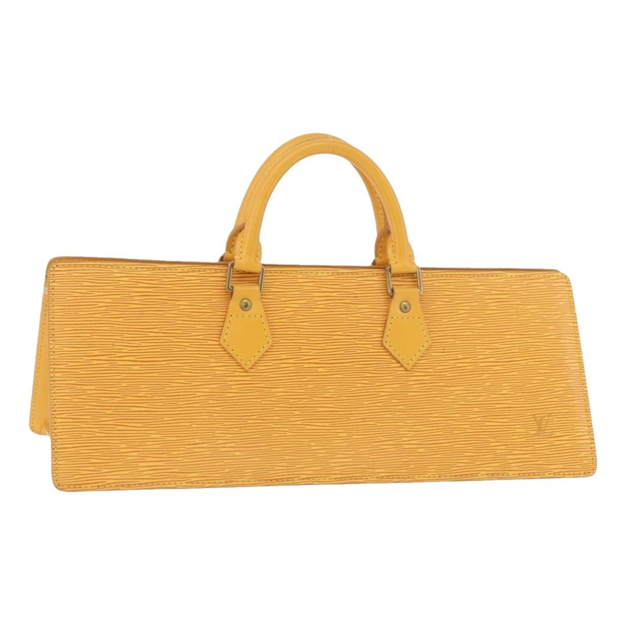 Triangle leather handbag