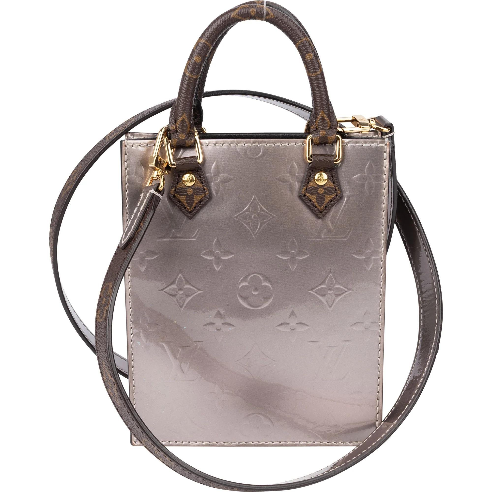 Plat patent leather handbag