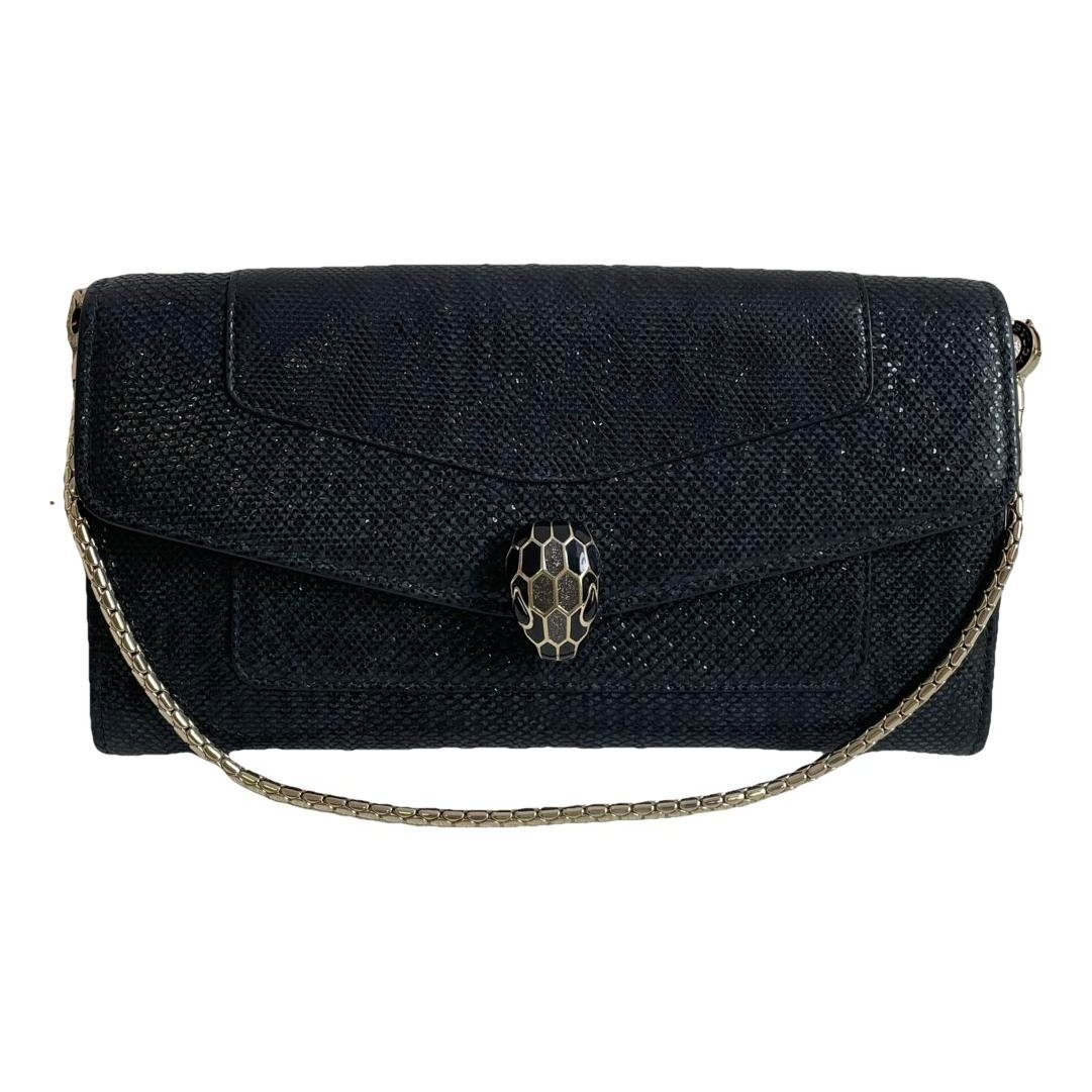 Serpenti leather clutch bag
