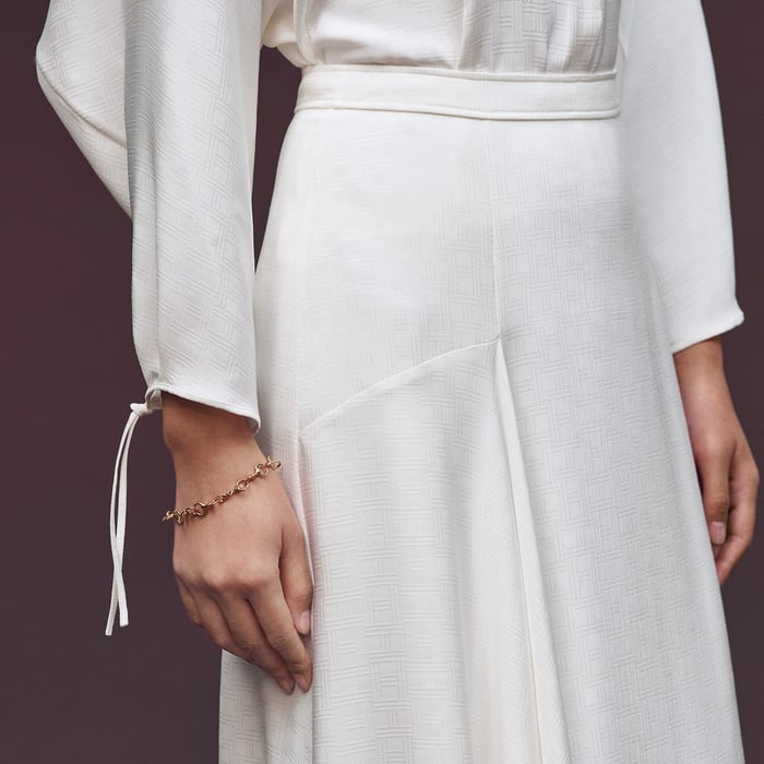Blanc Cassé "H Kelly" Flared Asymmetric Skirt