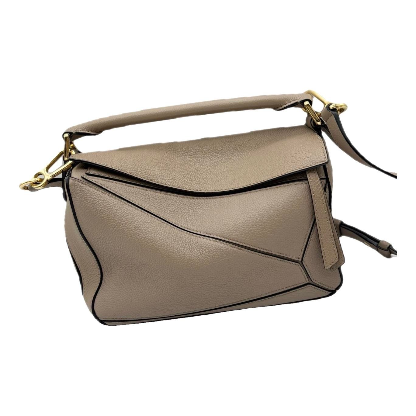 Puzzle leather handbag