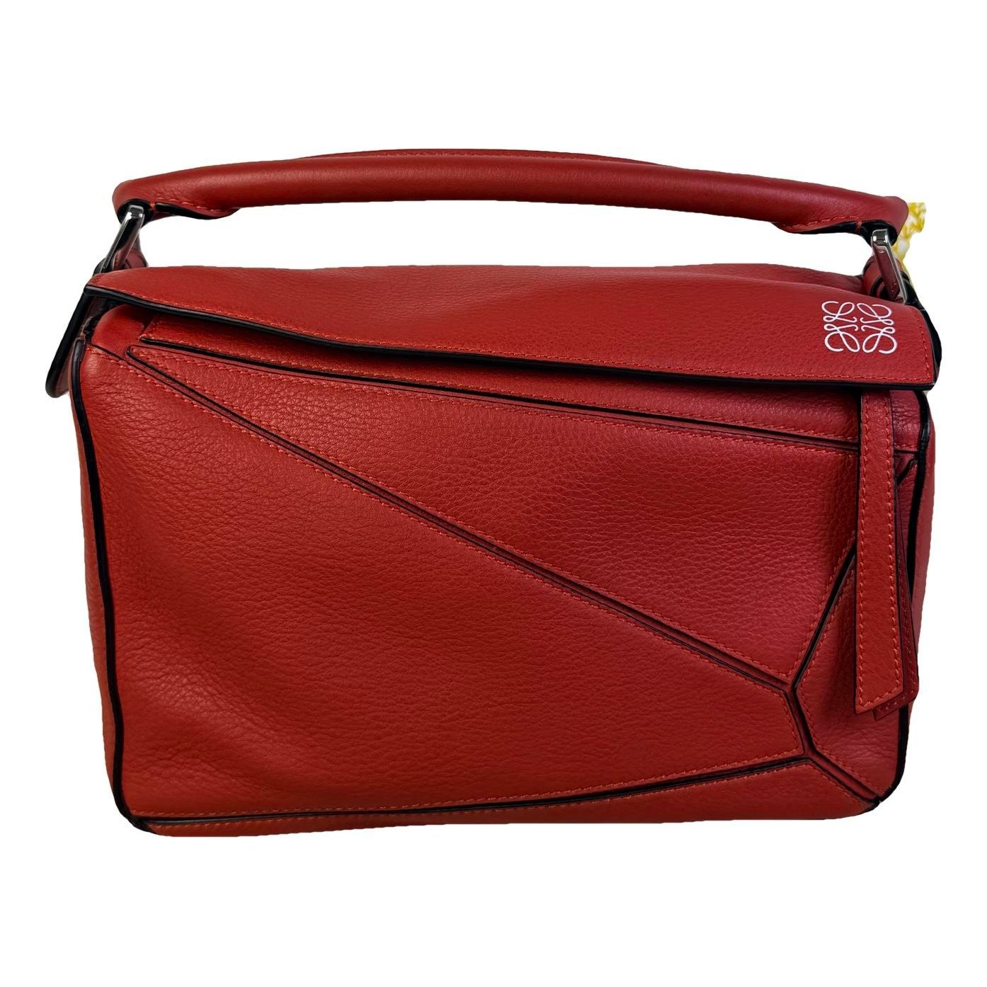 Puzzle leather handbag