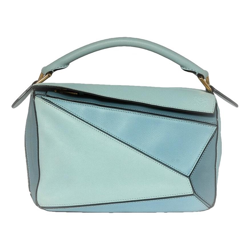 Puzzle leather handbag