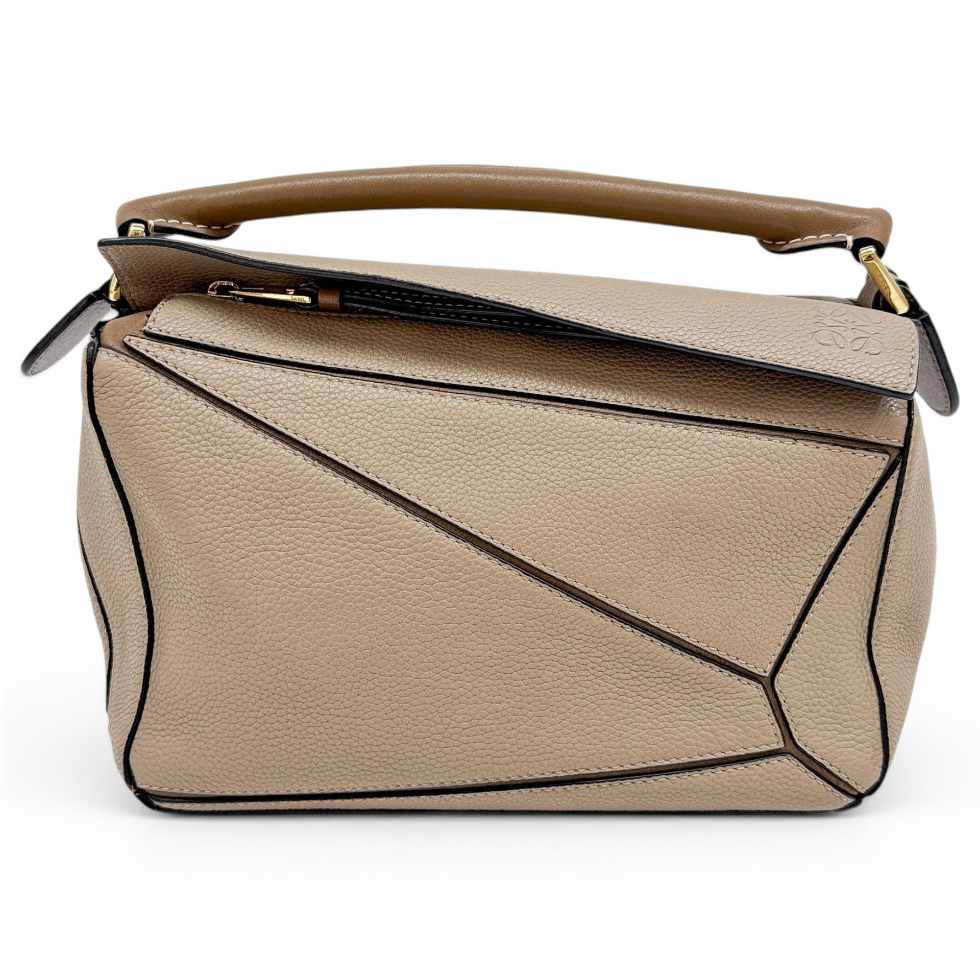 Puzzle leather handbag