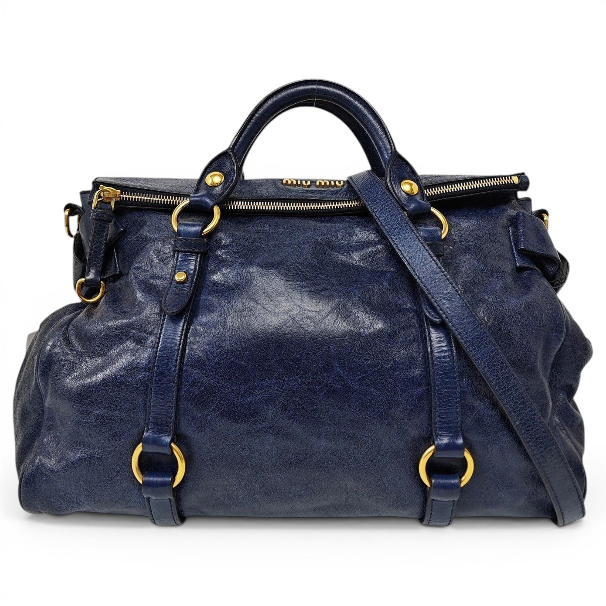 Bow bag leather handbag