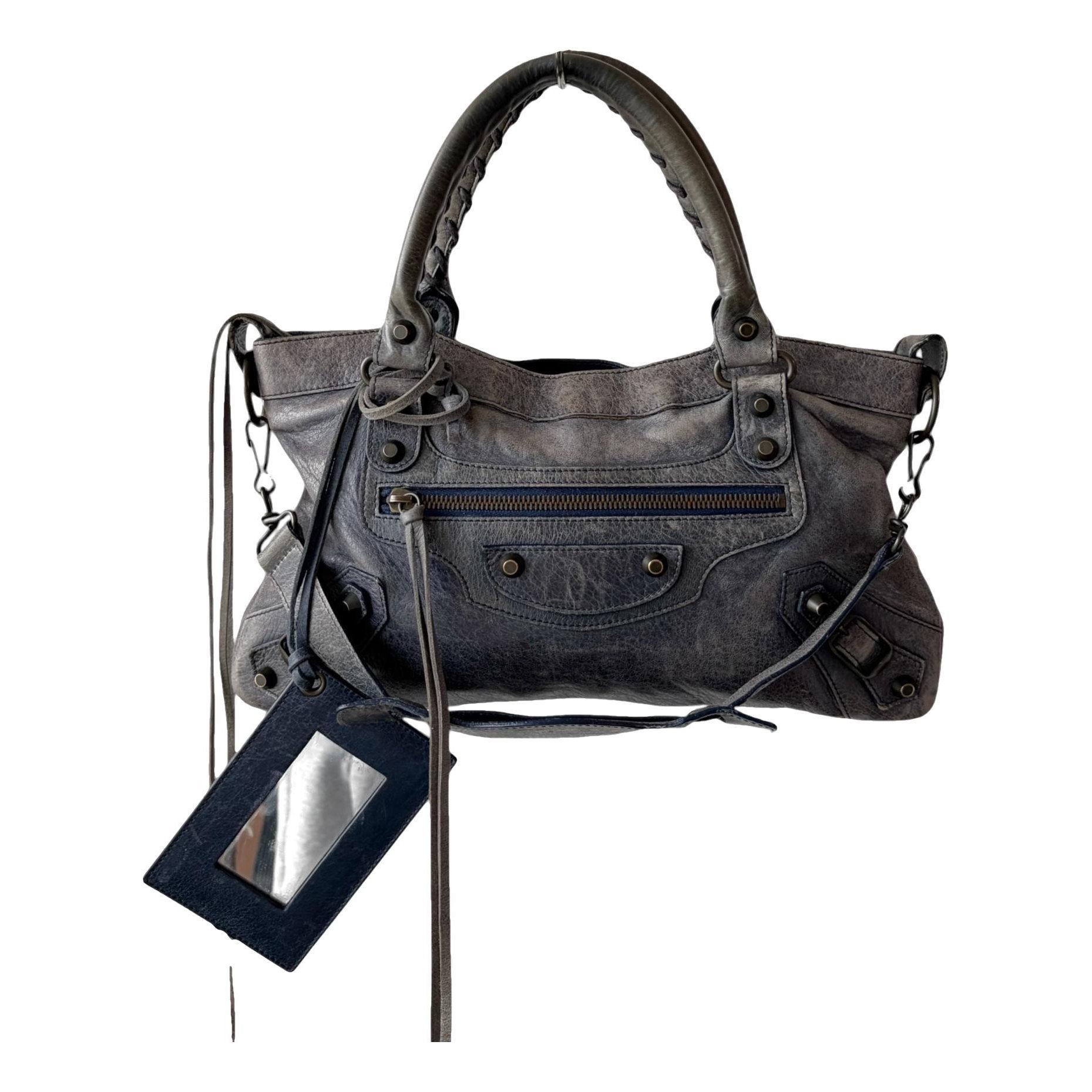 First leather handbag
