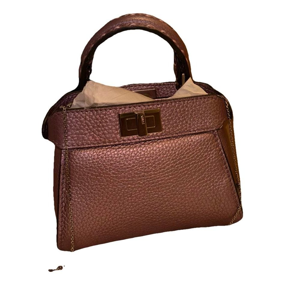 Peekaboo mini pocket patent leather handbag